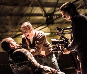 On the set of Limerick band's Fox Jaw new video - Richard playing a maniacal serial killer who tortures actor Kevin Kiely as director Shane Serrano captures the action. Picture: Tarmo Tulit