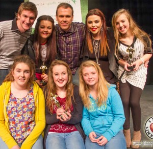 Richard pictured at the Limerick Youth Service Variety show with judge Dara Fahey, singer Leah Melling, judge Aoife McLoughlin, singer Sarah Meade (back) and members of the group Chase, Emma Meehan, Aoife Barrett and Georgia Donegan (front). Picture: Jonathan Baynes
