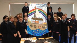 Noye's Fludde designer Emma Fisher has led workshops in four city schools, working on masks, costumes and design. Pictured with students with their poster