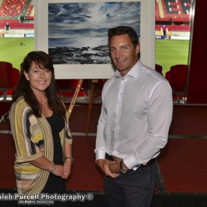 Ann Daly donates painting to Carer's Association
