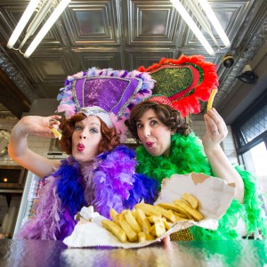 13/05/2015 REPRO FREE Jean McGlynn and Jessica Bray of Cabaret des Frites indulge in some sampling ahead of Limerick's Culture & Chips food carnival this June Bank Holiday weekend... Culture & Chips is a food carnival with a difference, taking place in Limerick City from May 28th to June 2nd, in an authentic specially transported 1920Õs Spiegeltent in the riverside ArthurÕs Quay Park. Featuring live music, food events, comedy, musical theatre, childrenÕs percussion and circus skills workshops, and lively discussion, and culminating in the World Chip Championships to find the best-tasting chip on the planet. Ê Mick Flannery, Eddi Reader (of Fairground Attraction fame), and Hermitage Green are just some of the musical acts bringing their live shows to the Culture & Chips Spiegeltent, as well as ÔPrinter ClipsÕ the side project of Bell X1 front man Paul Noonan accompanied by multi award-winning artist Gemma Hayes. Pic Sean Curtin Fusionshooters