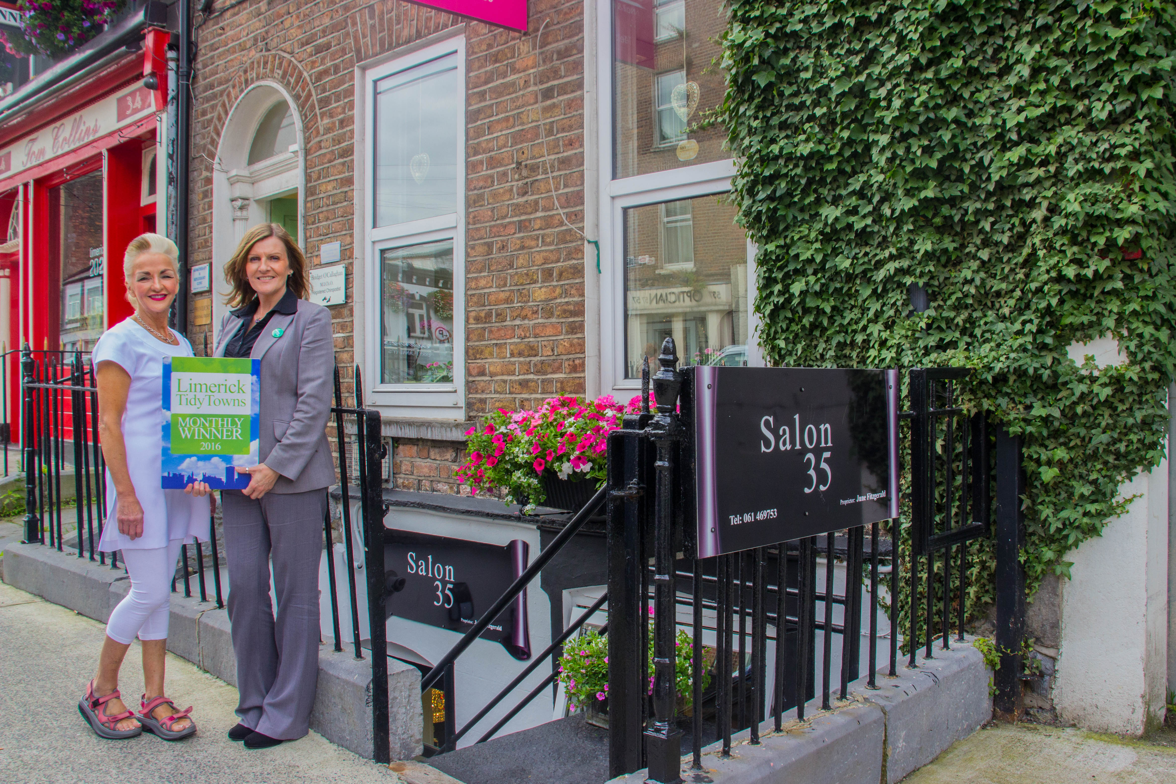 Limerick Tidy Towns award July 2016, Maura O'Neill of Limerick Tidy Towns with July winner June Fitzgerald of Salon 35, Cecil Street. Picture by Cian Reinhard