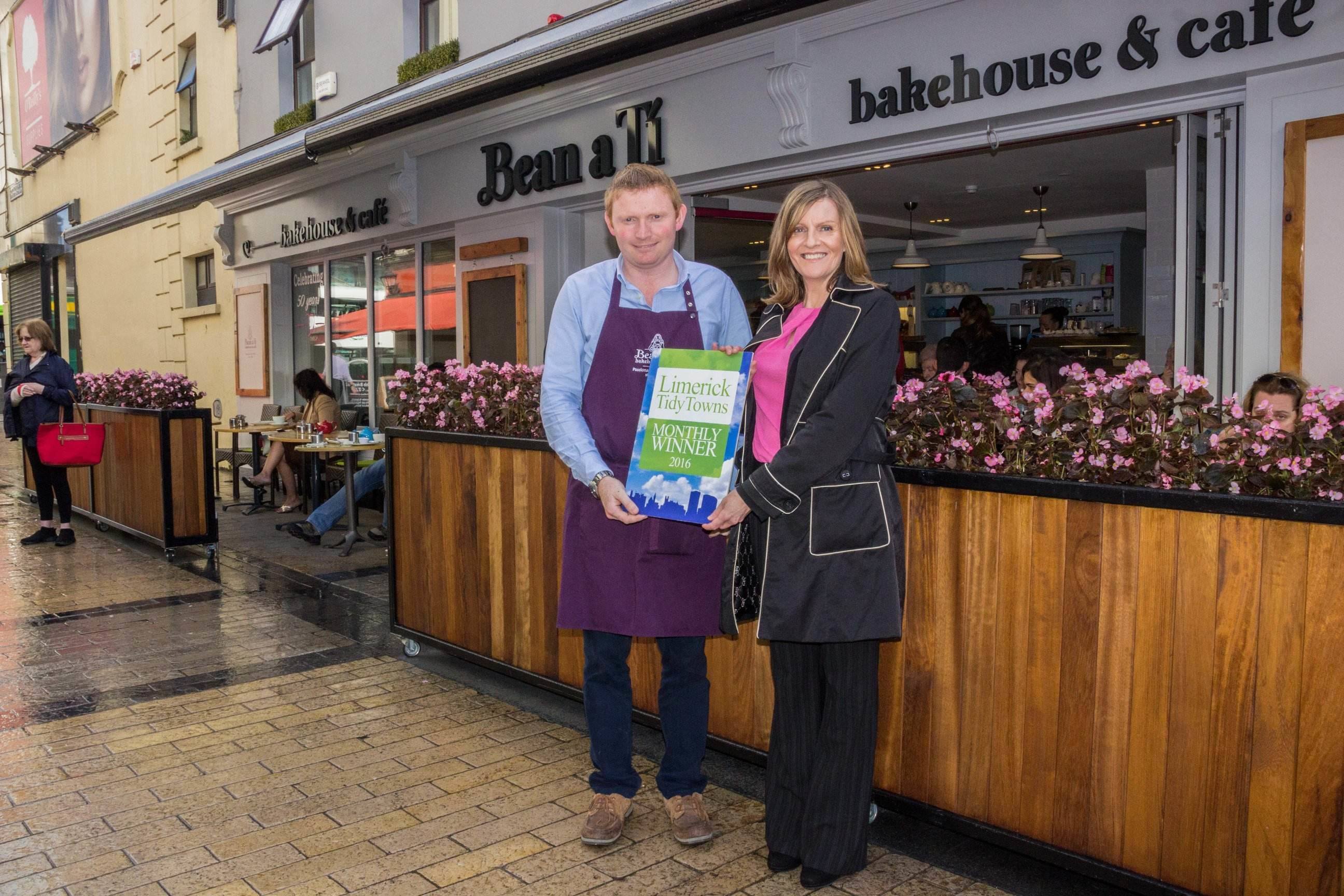 Limerick Tidy Towns Monthly Award September 2016. John Canty of Bean a Ti Bakery receiving the Limerick Tidy Towns Monthly Award September 2016 with Maura O'Neill of Limerick Tidy Towns. Picture Cian Reinhardt/ilovelimerick.