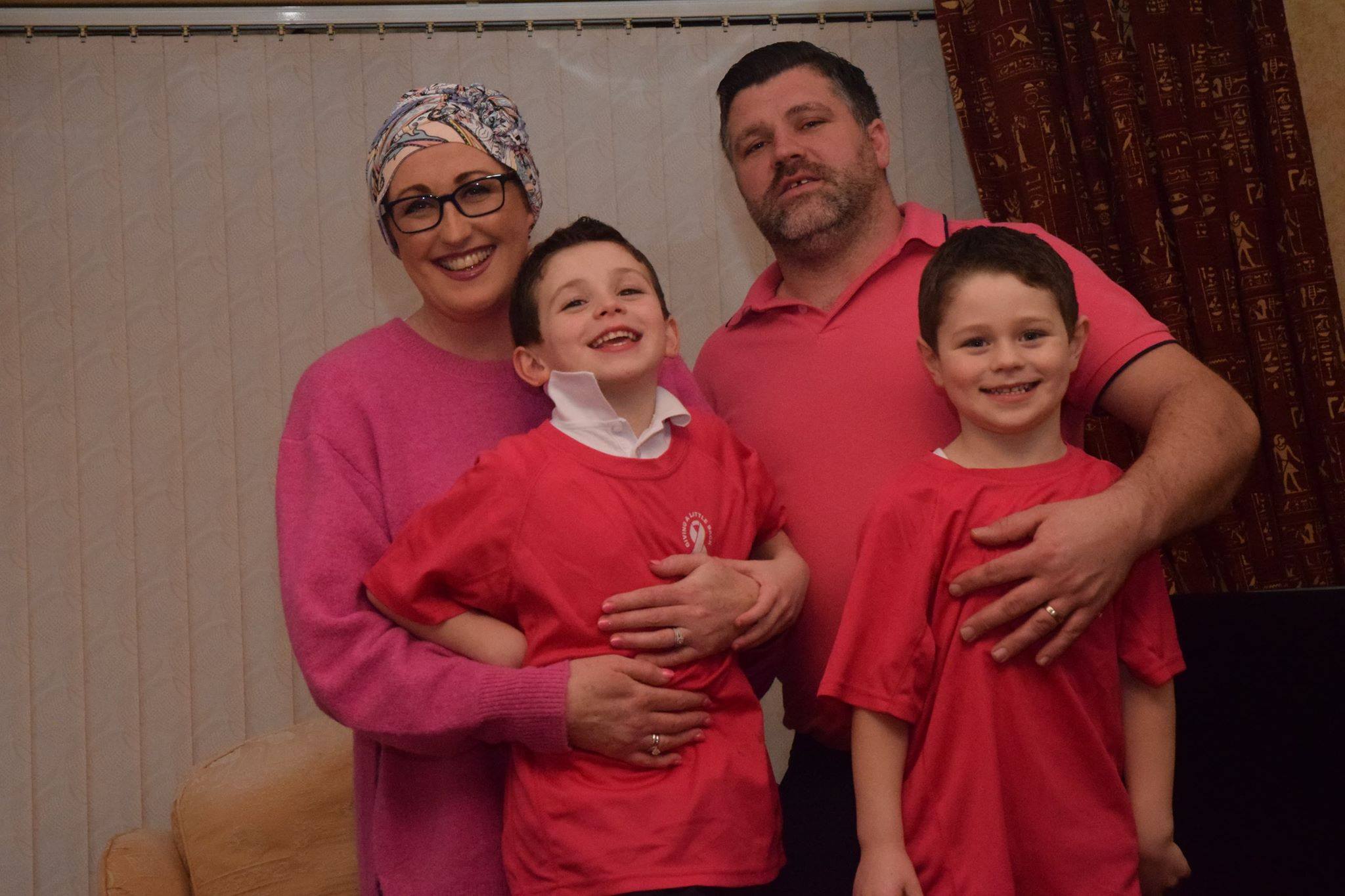 Meg with her husband Paul and two boys, Jack and Scott