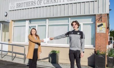 Newcastle West GAA club member Cian Sheahan pictured above with a representative from the Brothers of Charity