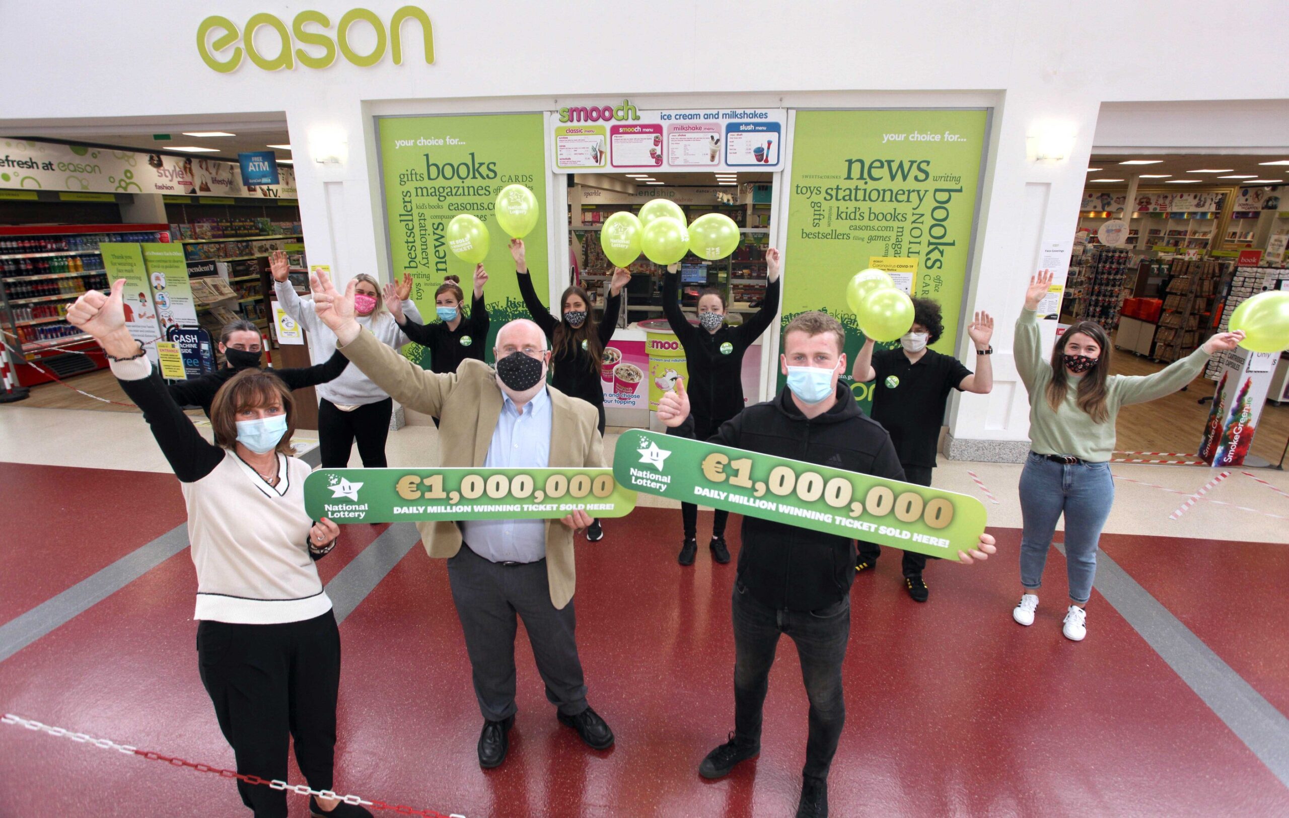 Eason Parkway Shopping Centre customer wins €1,000,000 on Daily Million game. Workers of Eason in Parkway Shopping Centre pictured above celebrating.