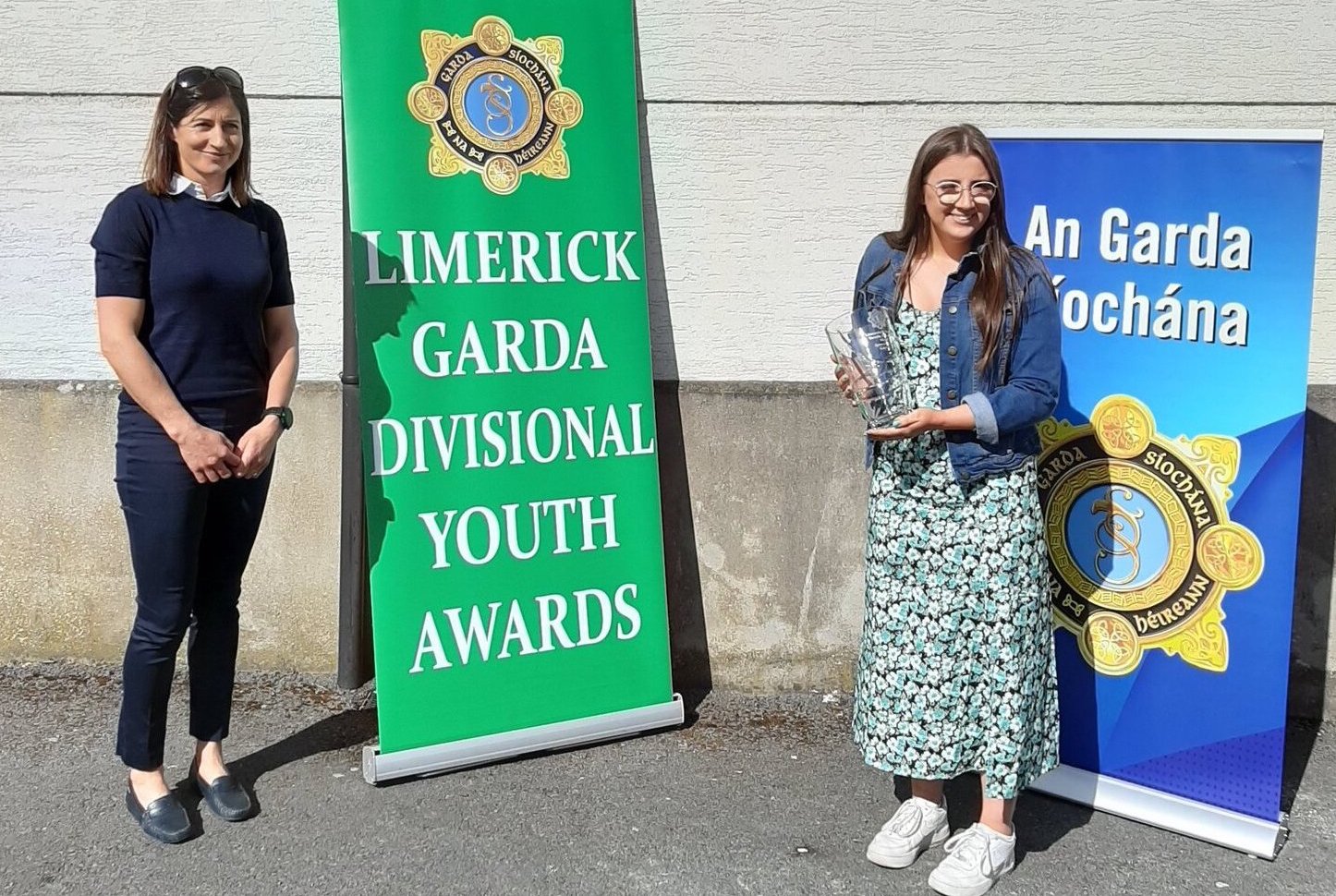 Pictured above is Emily O Shaughnessy receiving her award after raising an incredible €11,000 for charity