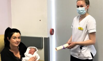 International Day of the Midwife - Joanne Ahern and her infant son, Evan, who was born at University Maternity Hospital Limerick at 00.57am on Wednesday May 5th, 2021, International Day of the Midwife, receiving a special commemorative certificate from UMHL Staff Midwife, Carrie Crowley.