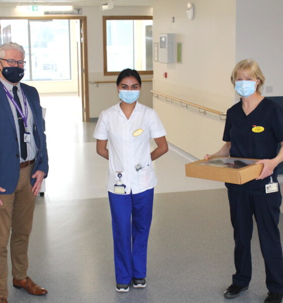 International Nurses Day 2021 - Declan McNamara, Director of Nursing, Medicine Directorate, presents breakfast treats to Anglea Cajes 4th year intern student nurse and Joan Magner Clinical Nurse Manager 1 on Ward 8C, UHL, in celebration of International Nurses Day 2021.