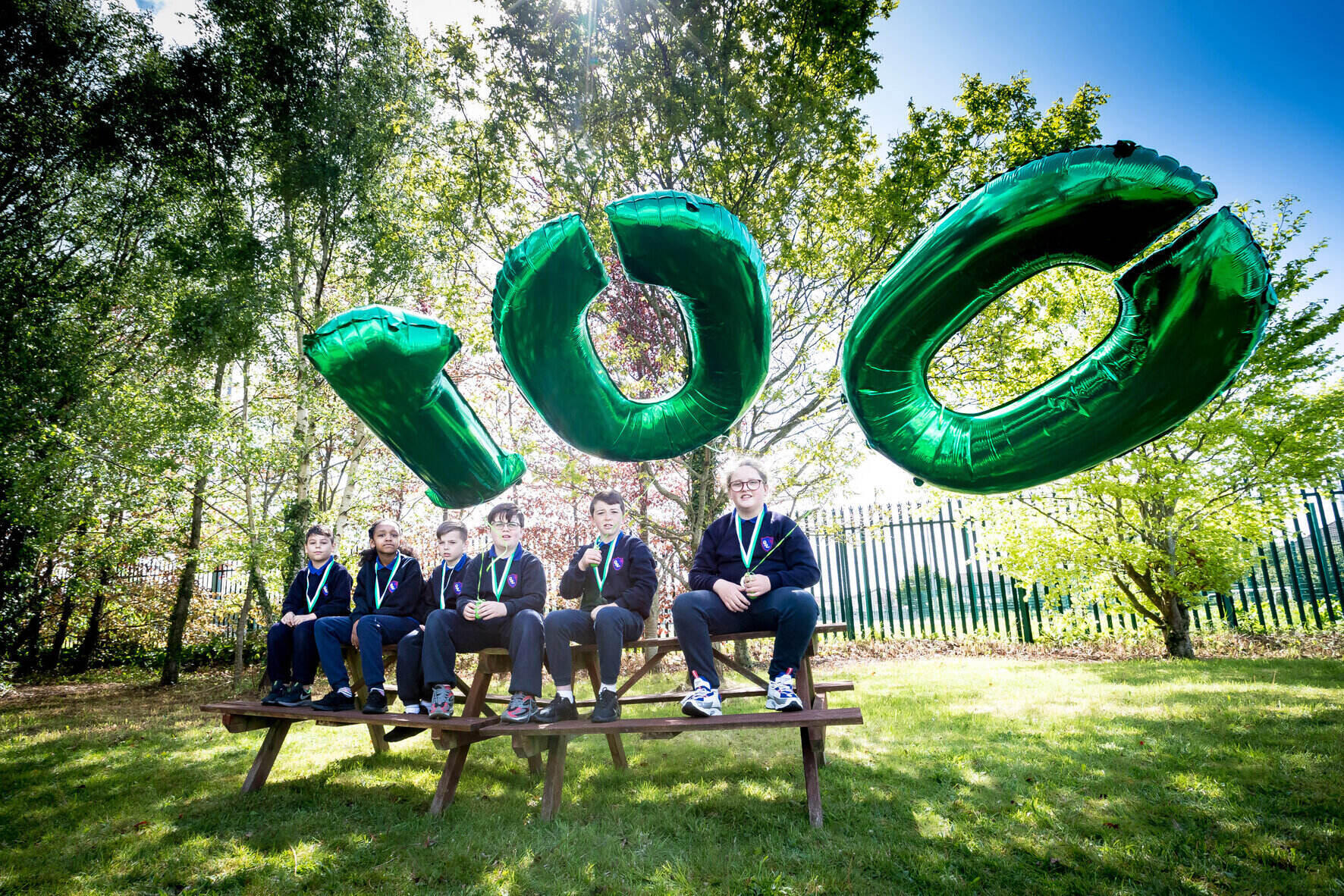 Investing in Children award - Third class pupils at Our Lady of Lourdes NS celebrating the 100th Investing in Children award. Picture: Keith Wiseman.