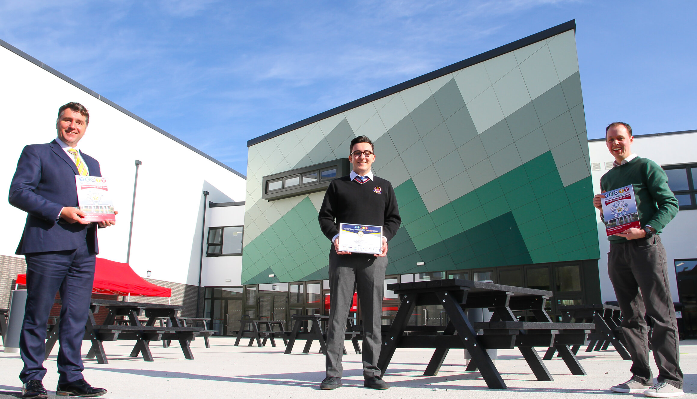 Young Economist of the Year 2021 - Principal Gerard O'Sullivan and Student Alex Barry and Business Teacher Mr. Martin Murphy pictured above. Alex won for his project which focused on the impact of the Covid-19 pandemic on climate action.