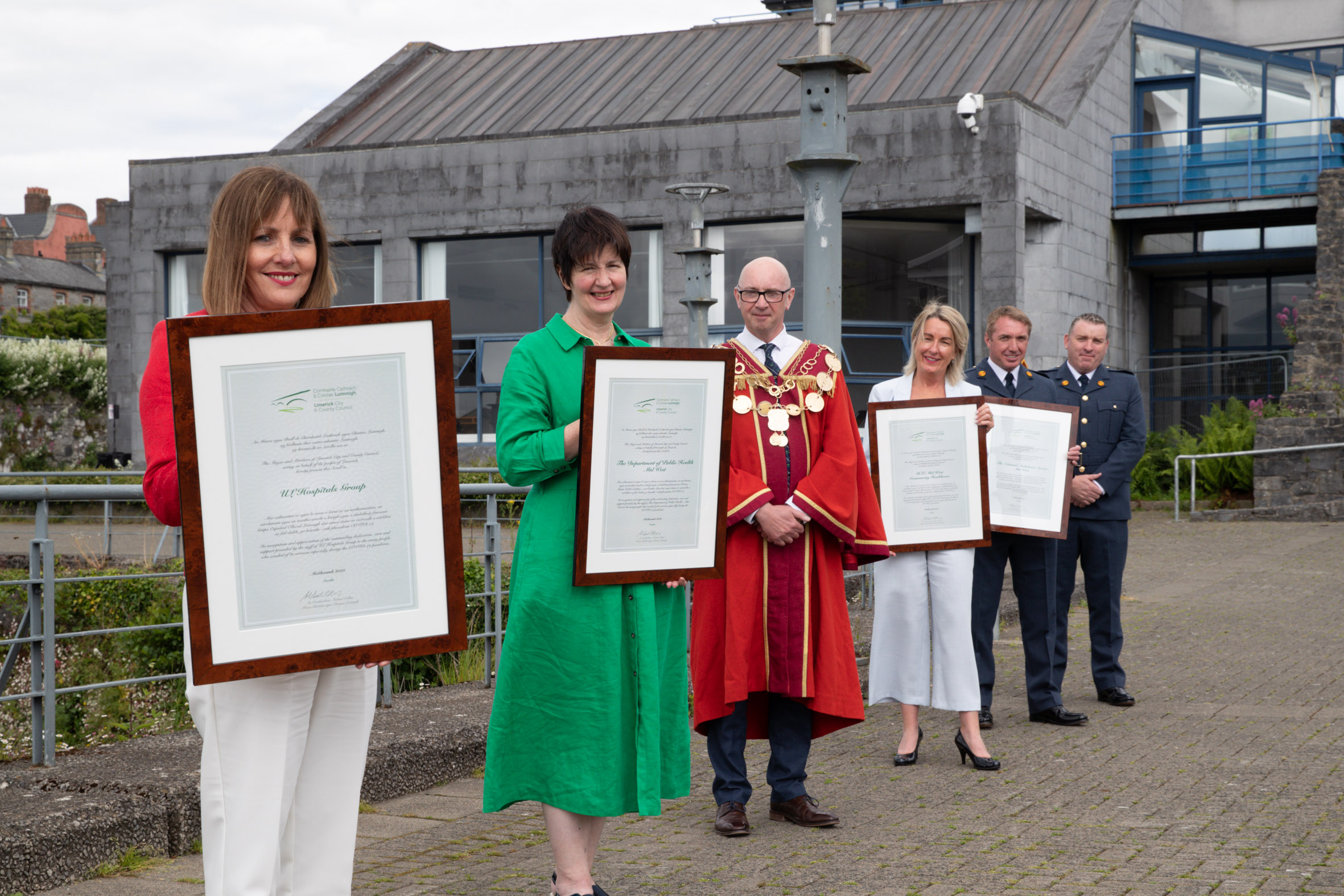 Mayor Michael Collins presented scrolls to representatives of the UL Hospitals Group, National Ambulance Service Midwest, Department of Public Health Midwest and HSE Midwest Community Healthcare. Picture: Keith Wiseman