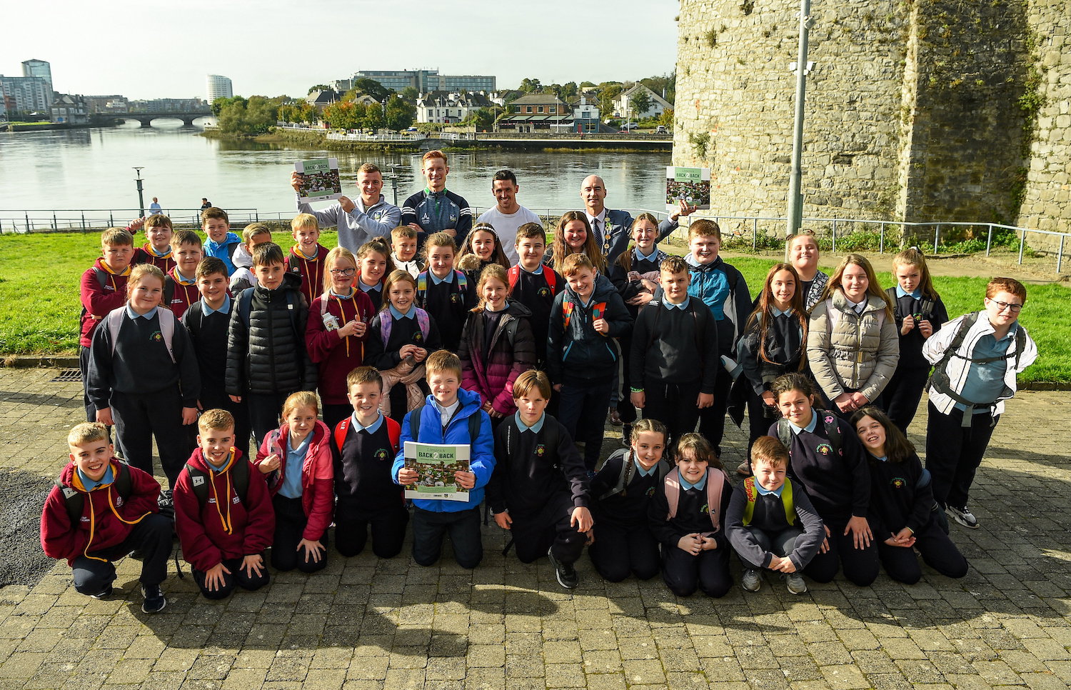 Limerick Back 2 Back book - 5th class students from Our Lady Queen of Peace Primary School along with Limerick hurlers, back row, from left, Peter Casey, William O'Donoghue and Darragh O'Donovan with Cllr Daniel Butler, Mayor of the City and County of Limerick at the launch of 'Back 2 Back' at Limerick City and County Council offices at Merchants Quay in Limerick. Picture: Diarmuid Greene/Sportsfile