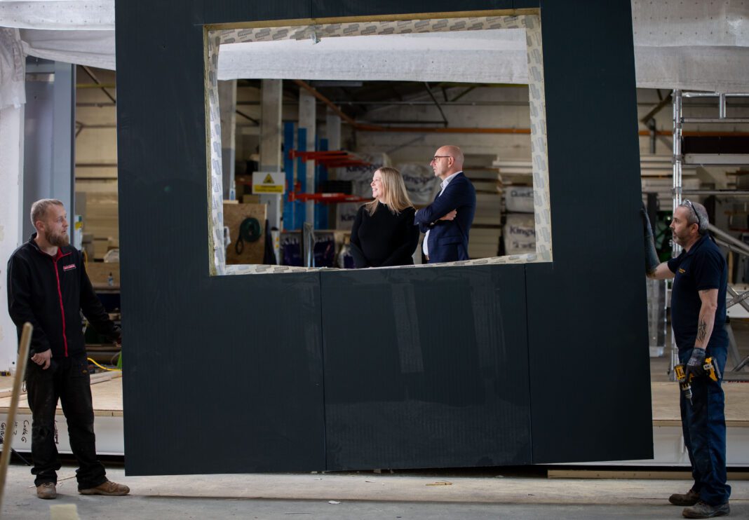 Modulacc Modulacc Marketing Lead at Orlagh Cassidy with company Managing Director Tony Chawke, with Kenneth Ryan and Terence Healy in the foreground, at the company’s new offsite building manufacturing facility on Atlas Avenue in Limerick. Picture: Alan Place