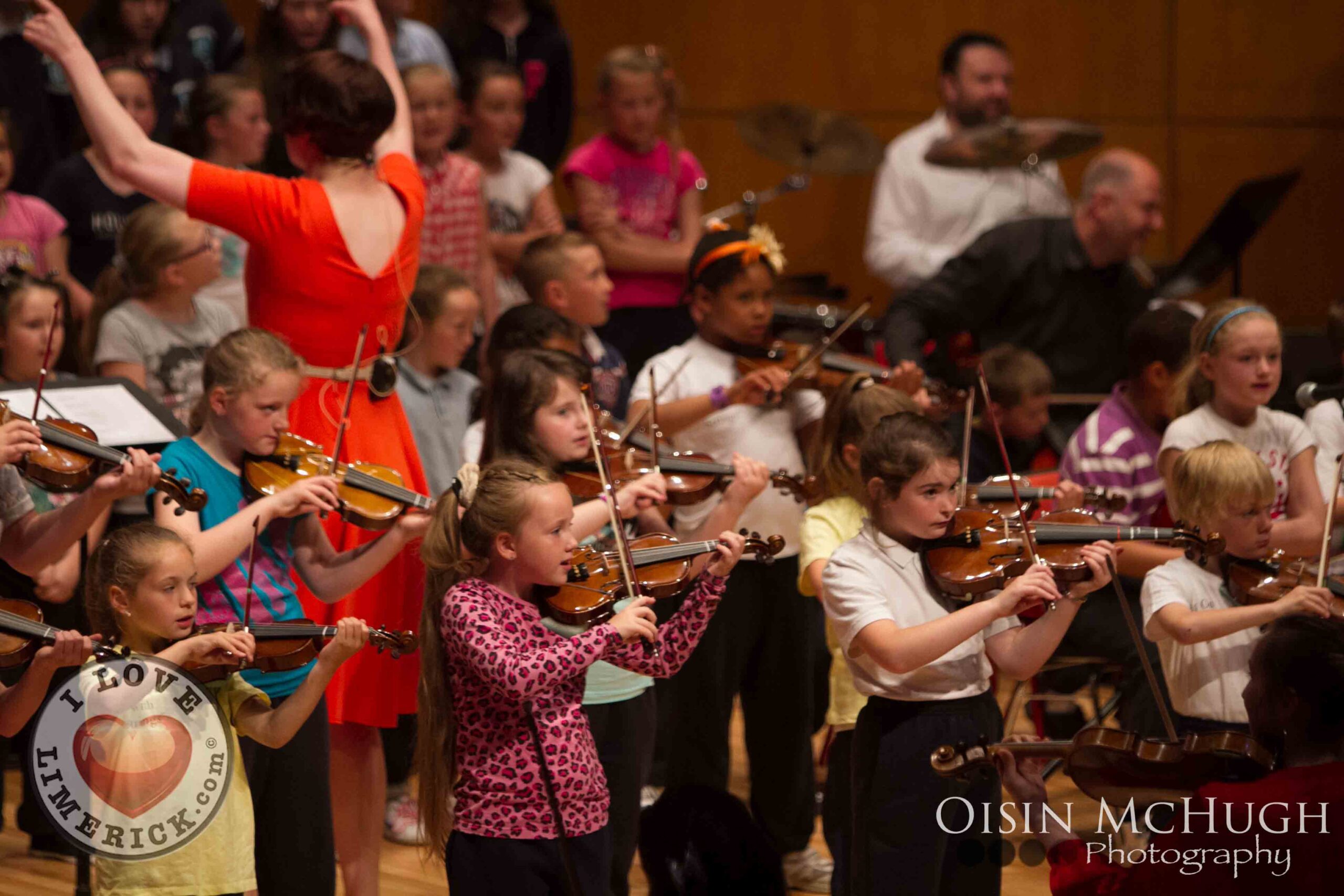 ICO initiative shortlisted for award - Pictured above are children from Galvone National School, Southill Junior School, St. Mary’s National School and St. Enda’s Community School performing with members of the Irish Chamber Orchestra at the University Concert Hall, Limerick for the Sing Out With Strings 6th birthday. Picture: Oisin Mc Hugh/ilovelimerick