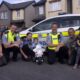 Una Quish (far left) pictured in 2019 with Gardai and family, provides round-the-clock care for her son, four-year-old Noah.