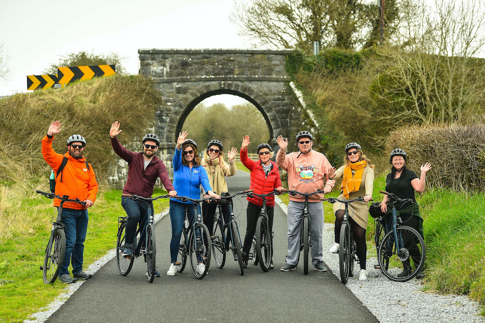 Meitheal tour groups provided the overseas buyers with opportunities to experience first-hand what their clients can expect to see and do while in Ireland. Group pictured above with Hugh Flood from Lazy Bike Tours, left, on the Limerick Greenway in Ardagh. Picture: Diarmuid Greene.
