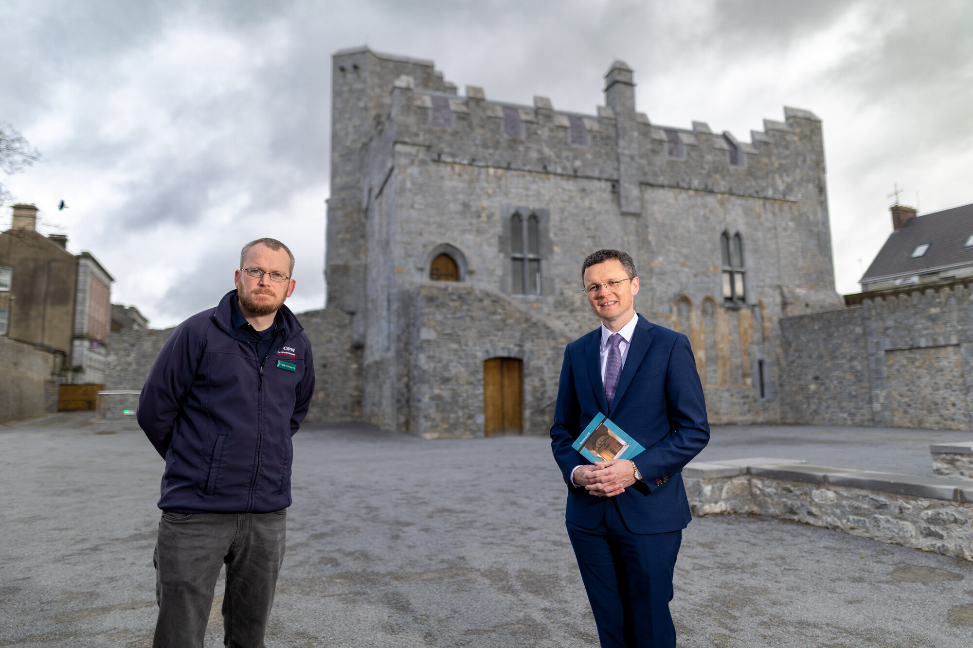 Desmond Castle reopens - Minister Patrick O'Donovan is pictured with Padraic O'Ruairc, OPW Guide Services at Desmond Castle as guided tours are reintroduced for the new season. Picture: Marie Keating.