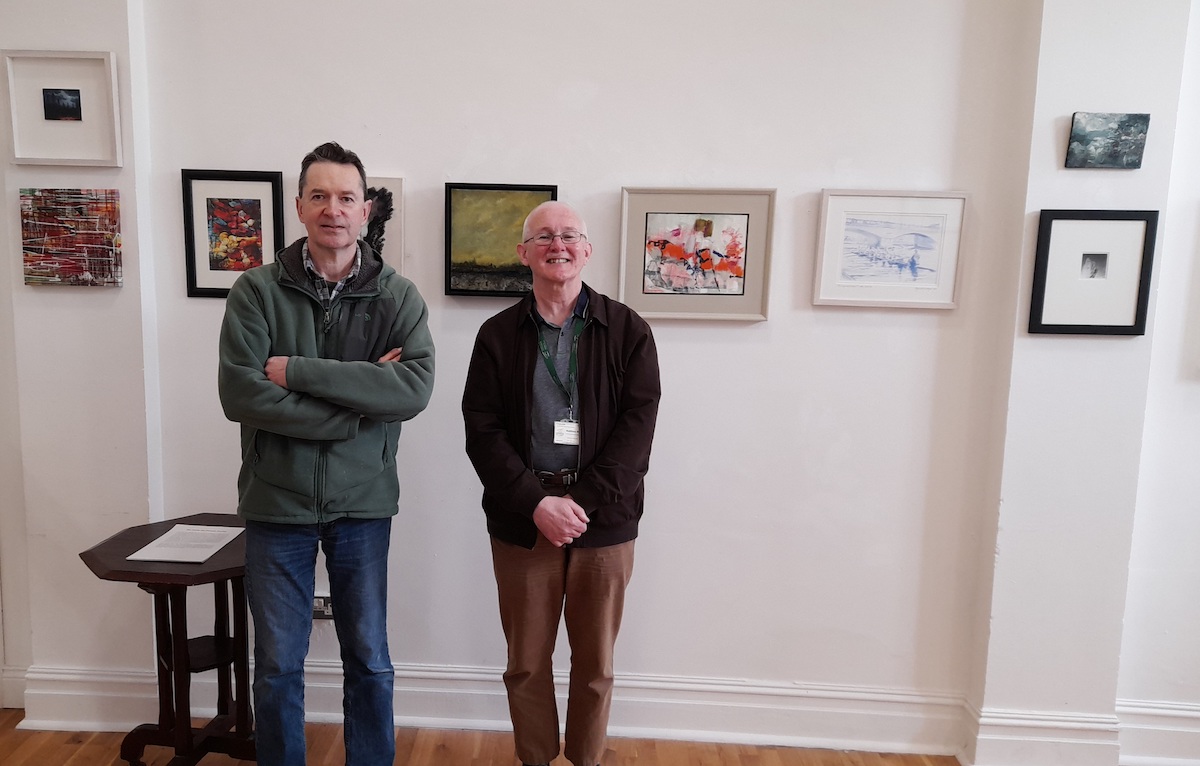 Limerick Museum exhibition - Dr Matthew Potter and Maurice Quillinan pictured above installing the exhibition