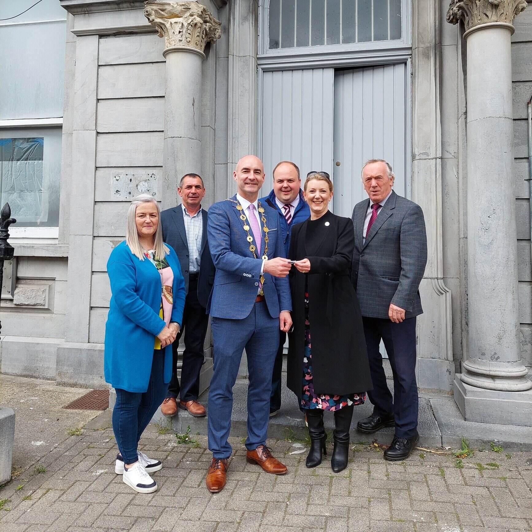 Limerick bank branches - Mayor of Limerick City and County, Cllr Daniel Butler, recently received the keys to the Rathkeale Bank of Ireland building purchased by the Council.