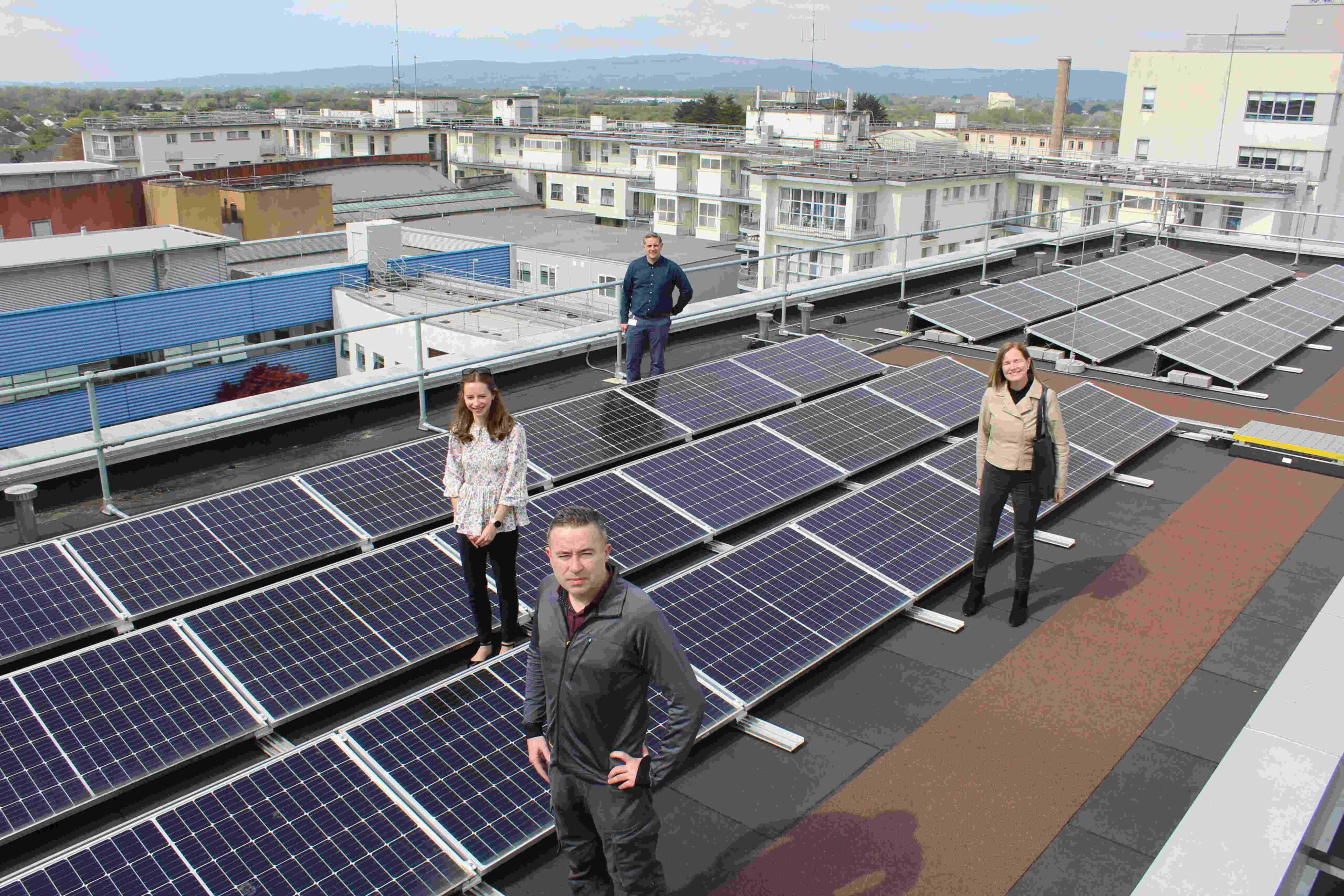 UL Hospitals Group sustainability - Pictured at the bank of PV cells on the roof of the 60-Bed Block at UHL are (front): Kevin Mahoney, Electrical Maintenance Manager, UL Hospitals Group; with (middle, from left): Rachel Keating, Energy Officer, HSE Capital & Estates; and Clodagh Hanratty, Estates Manager, HSE Capital & Estates; and (rear) Niall Joyce, Group Building and Maintenance Manager, UL Hospitals Group.