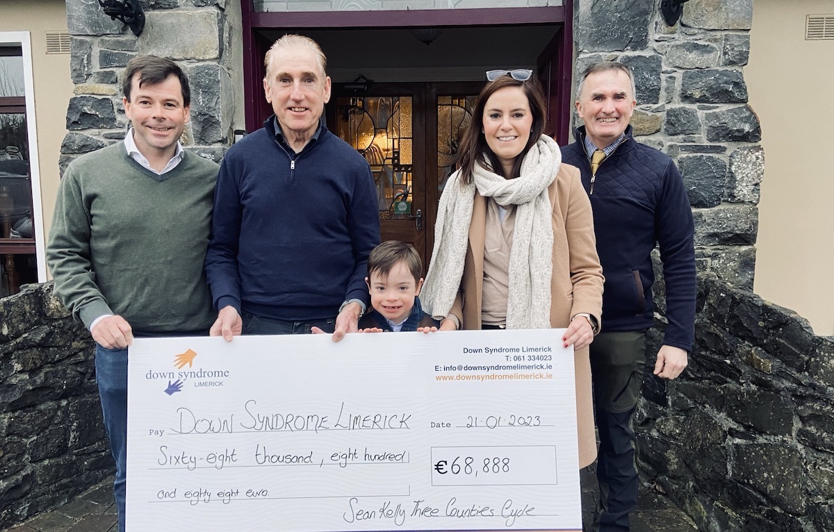 Cycling legend Sean Kelly presents cheque for almost €70,000 to Down Syndrome Limerick from proceeds from the Three Counties cycle