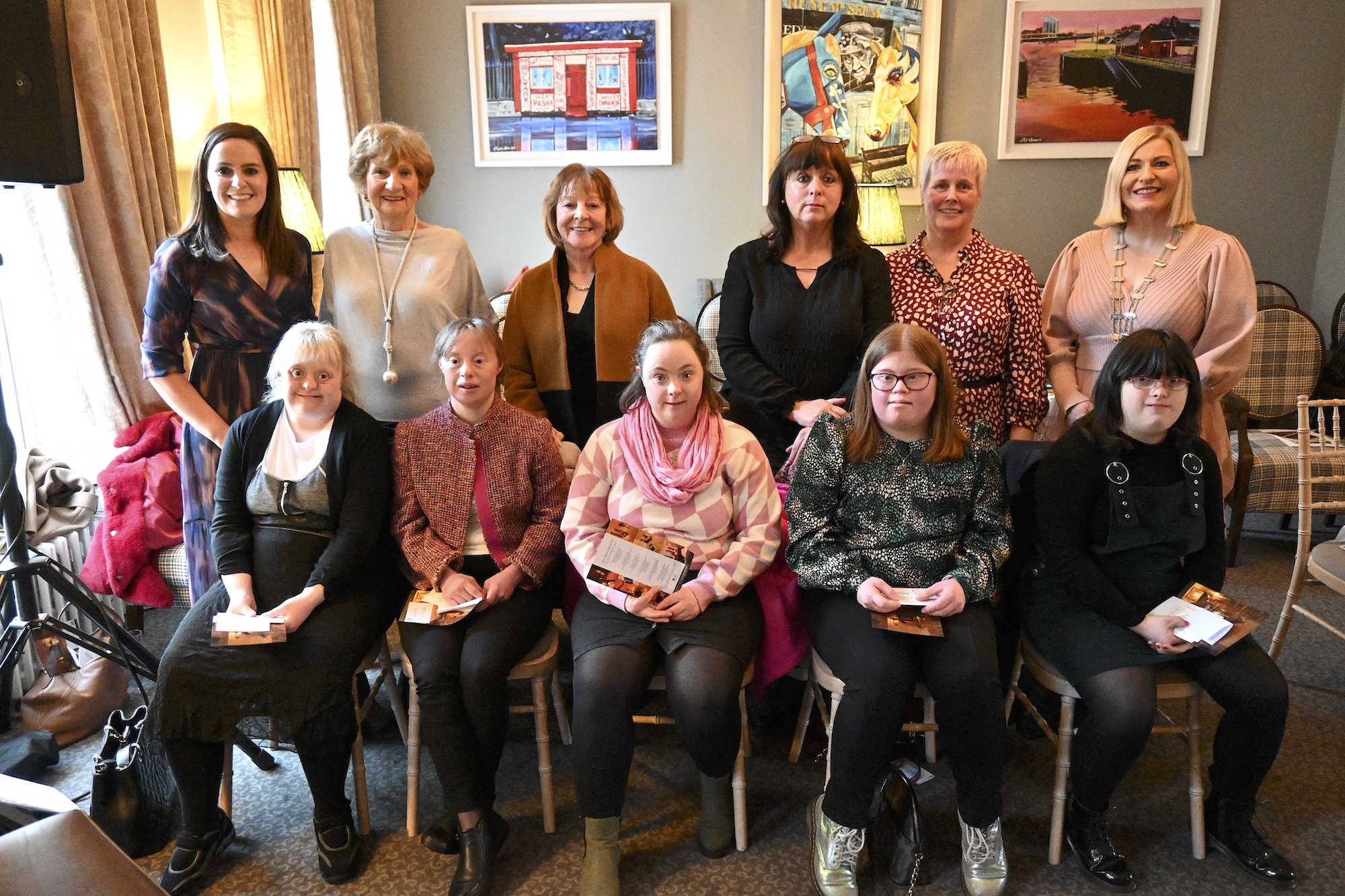 Funky Socks Coffee Morning for World Down Syndrome Day. Ellen Tuffy, Chairperson, Down Syndrome Limerick (back left) and Karen Ronan, president of Network Ireland Limerick (back right) with supporters of Down Syndrome Limerick.