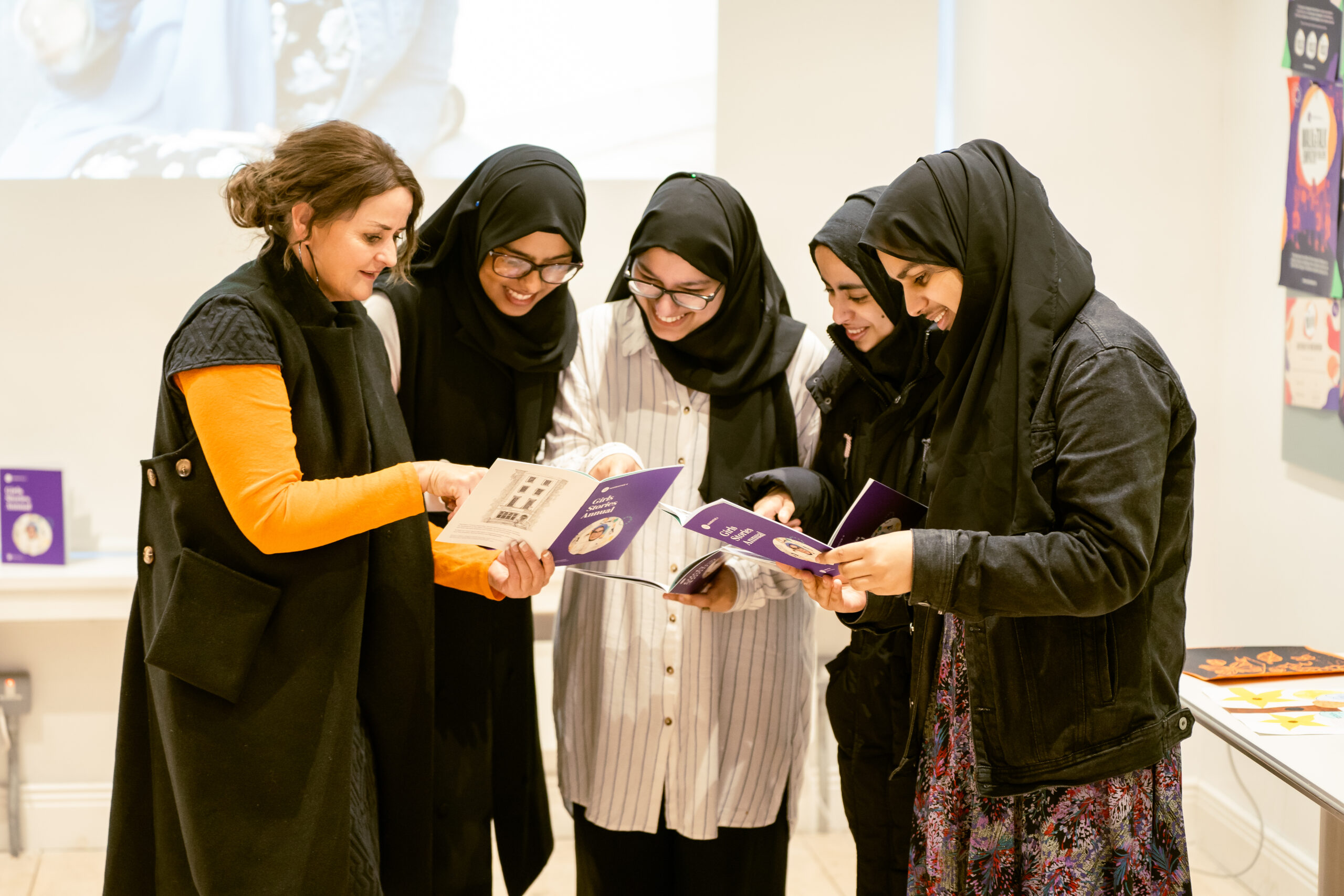 Sheila Richardson (Visual Artist, Creative Therapist and Girls Stories Project Coordinator) with Girls Stories participants. narrative 4 publication