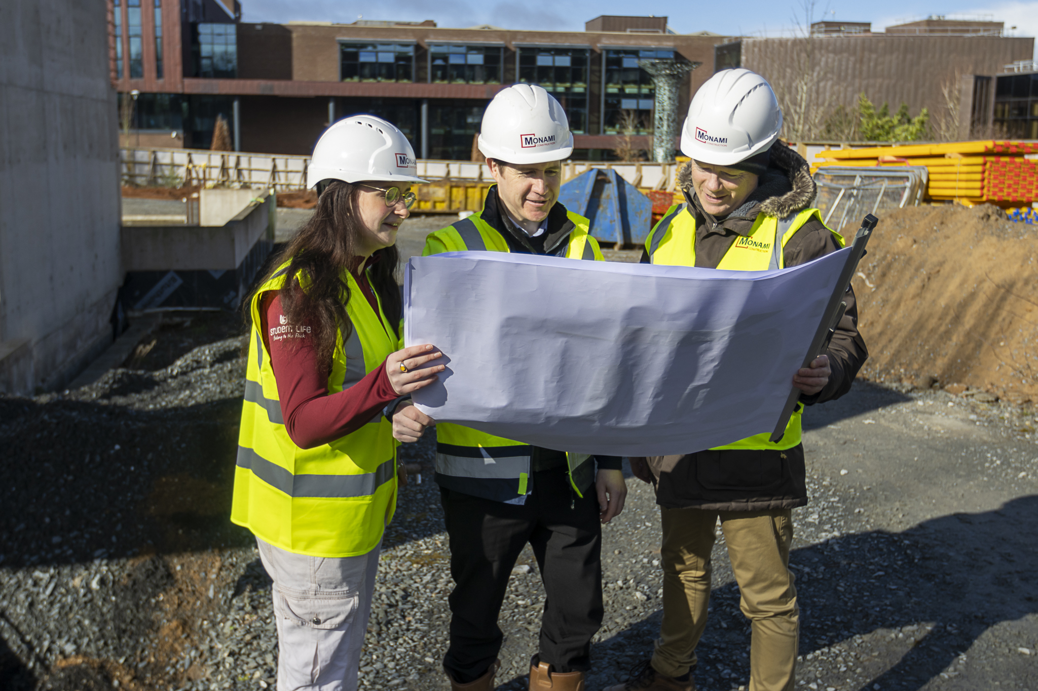 REPRO FREE Maeve Gilmore, Deputy Student President, Trevor Cavanagh, Regional Director Monami and Patrick Ryan, UL Associate Vice President Student Engagement looking at plans for the new Student Centre at UL