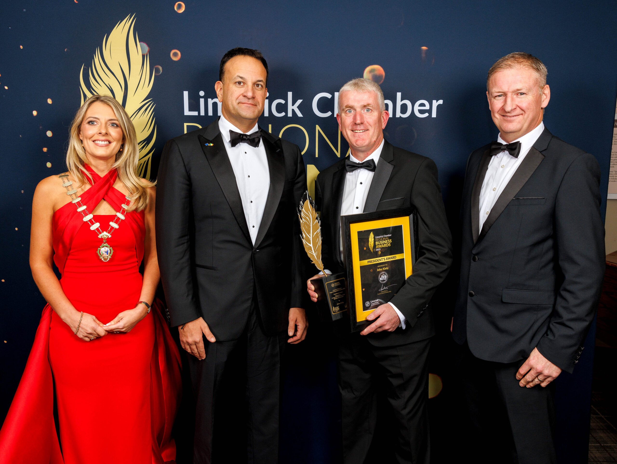 Pictured at Limerick Chamber President’s Dinner & Regional Business Awards, attended by Taoiseach Leo Varadkar, were L-R, Miriam O'Connor, President Limerick Chamber, An Taoiseach Leo Varadkar, John Kiely and Damien Garrihy, AIB . The 2023 Chamber President's award was presented to Limerick hurling manager John Kiely on behalf of the entire squad for the inspiration they've given, including Limerick businesses, through their remarkable achievements in winning four-in-a row All-Ireland senior hurling titles and five in six years. Overall Company of the Year award went to health-tech company Carelon Global Solutions Ireland, which is one of the newest additions to Limerick's thriving FDI sector and has hired 230 people since it was launched in Limerick two years ago this month.