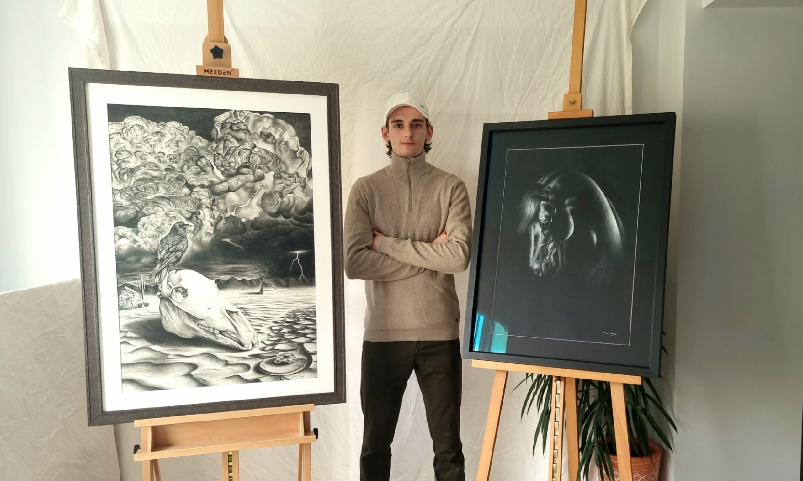 Evan Healy Humble Beginnings photographed with two of his artworks 'Meridian' and 'Morning Light' to be exhibited at The People's Museum of Limerick