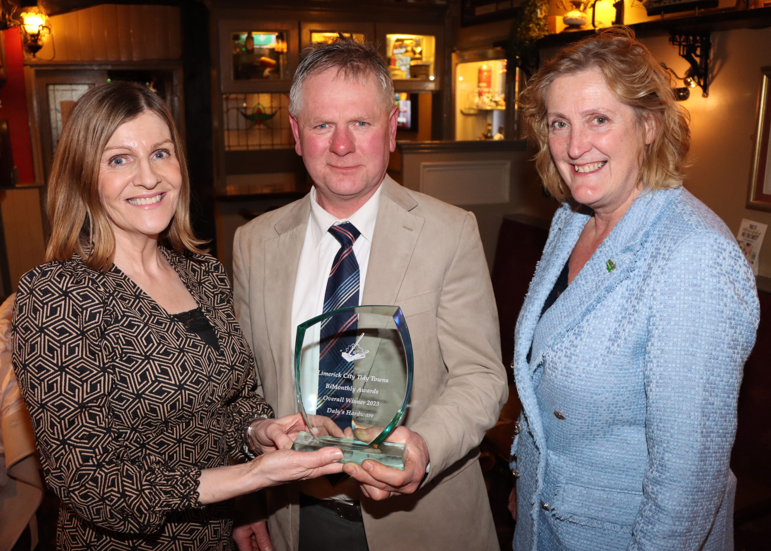 2023 Limerick City Tidy Towns winner is Daly’s Hardware and pictured receiving the award from Helen O’Donnell and Maura O’Neill is Roger Daly from Daly’s Hardware. Picture: Adrian Butler, Limerick Leader