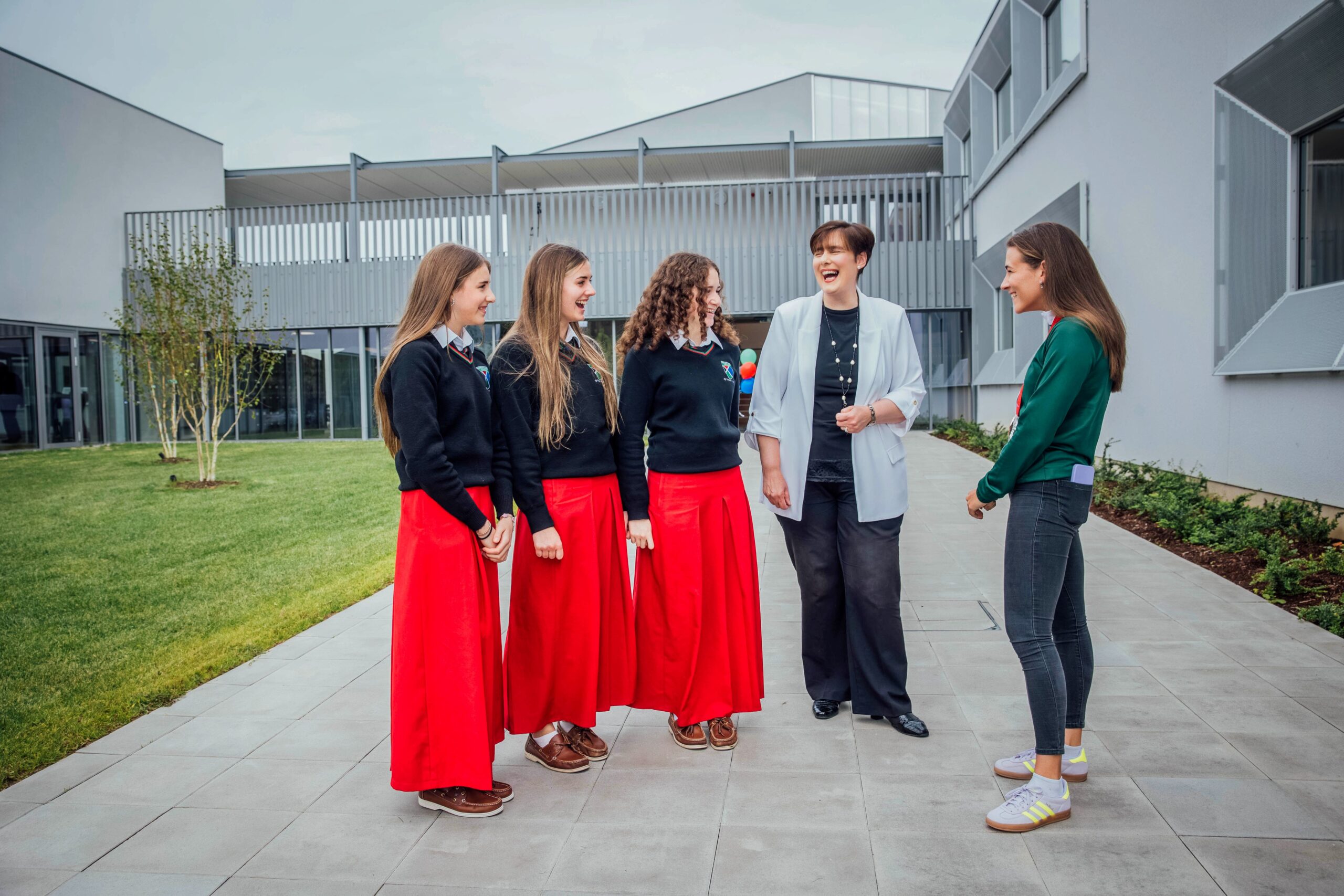 No Repro Fee Sadhbh, Sorcha & Meadhbh Ní Riain, and past pupil and Paris 2024 Paralympics champion, Róisín Ní Riain pictured at today’s official opening by Minister for Education Norma Foley TD of Gaelcholáiste Luimnigh’s brand new school campus at Clare Street in Limerick Pic. Brian Arthur