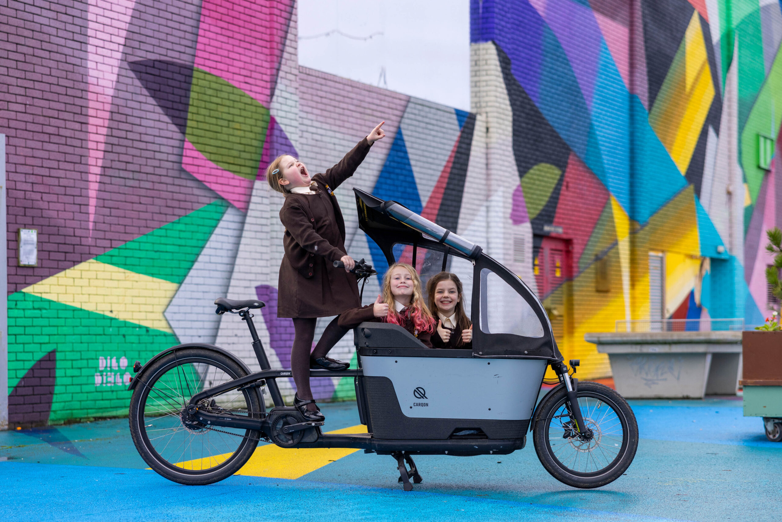 A University of Limerick research project examining e-bike use has found that a considerable percentage of those who took part in a study would be willing to purchase their own bike. Milford National School pupils Edie Hogan, Carrie Green and Molly O’Regan at the launch of the second phase. ISCycle (Inclusive e-bike uptake and Sustainable use) is an innovative UL-led research project examining how e-bikes can change transport behaviours to improve health and protect the environment. The project aims to generate evidence for more inclusive cycle access policies and schemes and has been examining the impact of e-bike loans in workplace settings since 2022. Pic Sean Curtin .