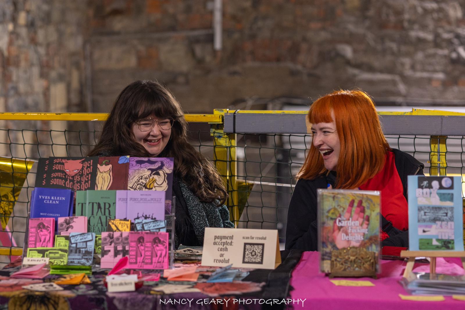 Mot Collins (left), and Grace Coakley (right) at Limerick Zine Fest 2024 Zine Market. Photo by Nancy Geary Photography