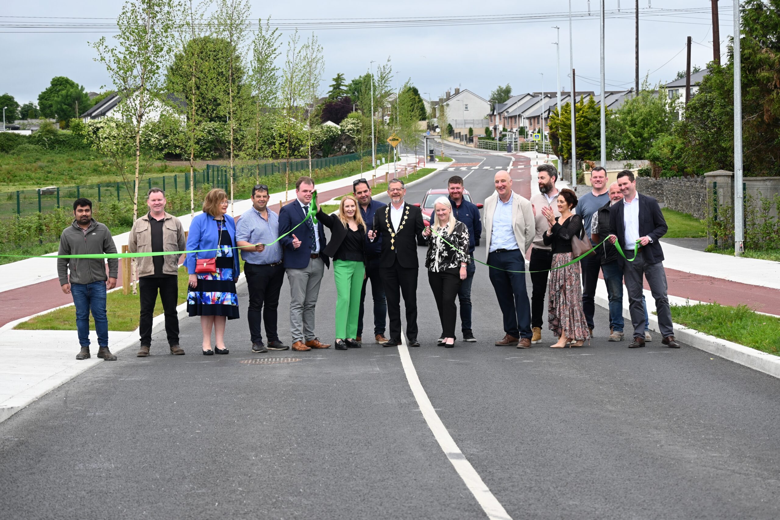 Mayor of Limerick, John Moran proudly cuts the ribbon at the opening of the Bloodmill Road Extension, completed by Priority Construction, pictured was Senator, Maria Byrne, Dan McSweeney - Príomh Chomhairleoir, Cllr, Elena Secas, Cllr, Sarah Kiely, Hugh McGrath, LCCC, Paul McCarroll, NTA also pictured was members of Priority Construction and MHL, Architects