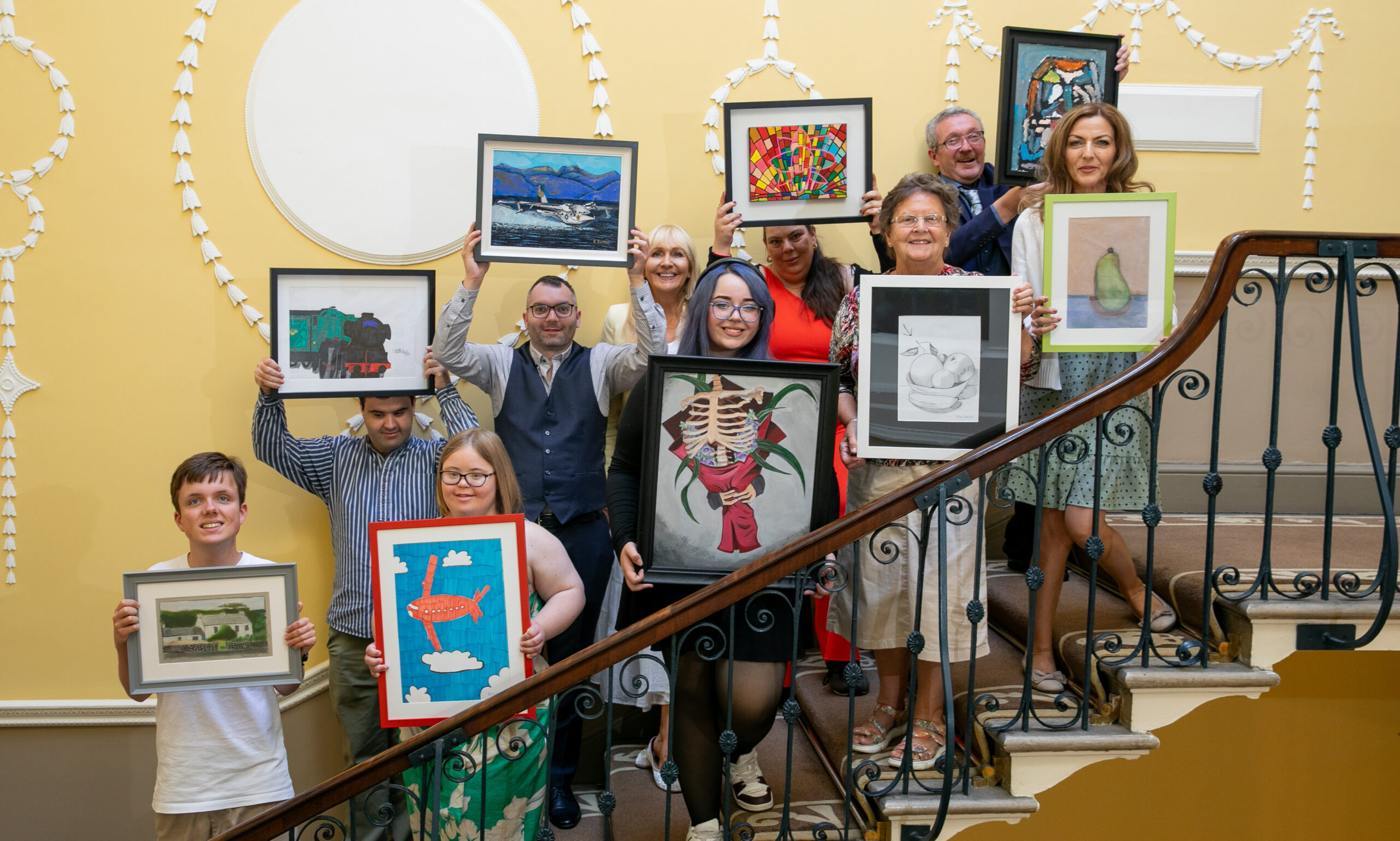 Broadcaster Miriam O’Callaghan pictured with participating artists & suppoorters at the launch of the Connecting Artists 2025 Exhibition at the Royal College of Surgeons in Ireland (RCSI). Organised by Connections Arts Centre (CAC), the exhibition showcases work by artists who are neurodivergent or have intellectual disabilities and marks the culmination of a 10-week national online mentoring programme developed to support their artistic growth and increase visibility in the arts. Now in its fourth year, the Connecting Artists Programme continues to champion inclusion and creative development through mentoring, peer learning, and public exhibitions. The exhibition is free to attend and runs until Saturday, 19th July. For more information, visit connectionartscentre.ie. Photo: Gareth Chaney