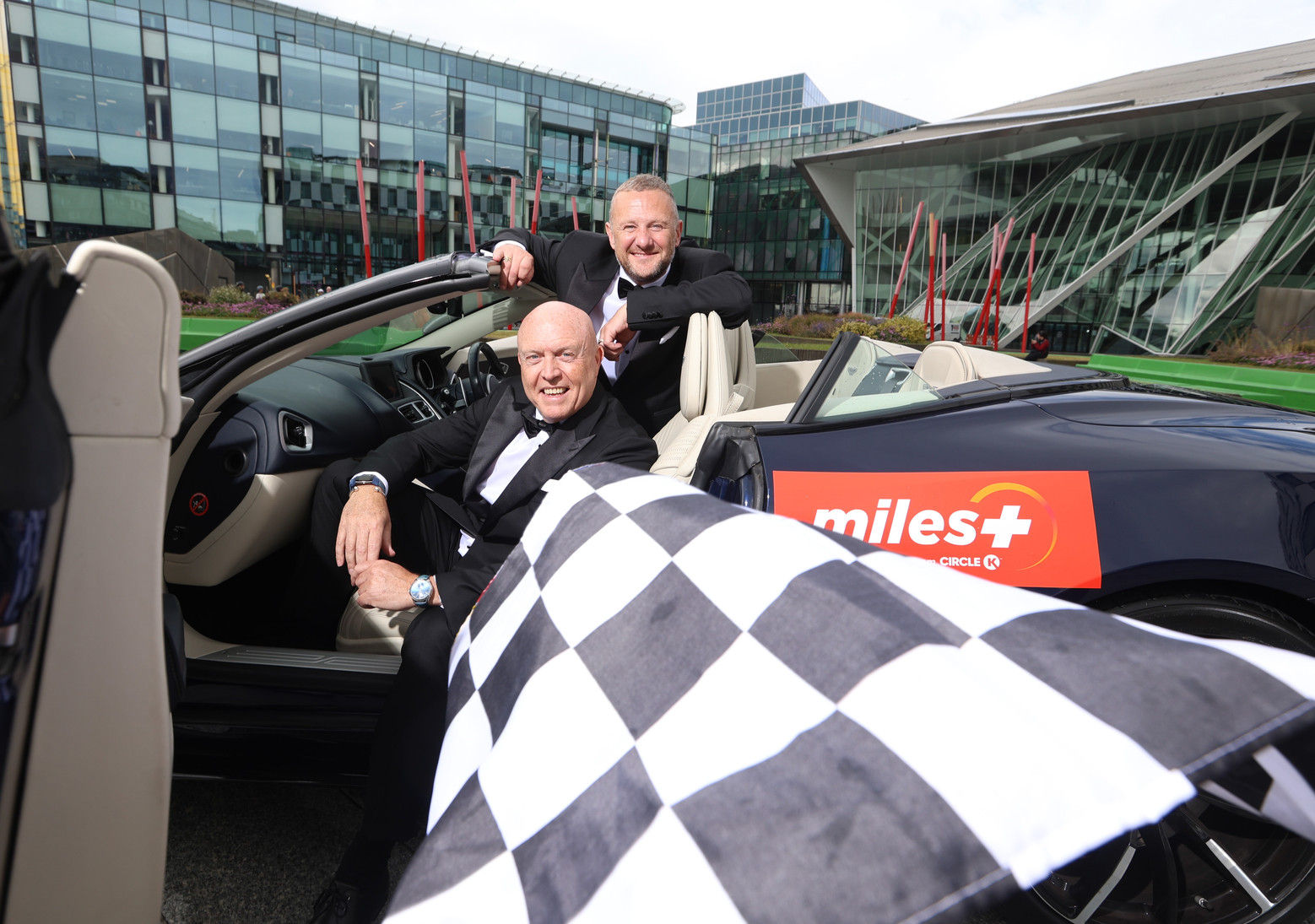 Dublin, Ireland. In a scene fit for Her Majesty’s Secret Service, Radio Nova’s PJ Gallagher and Jim McCabe got to grips with a rare Aston Martin DB11 to announce that the Jack and Jill Children's Foundation is the official charity partner for Cannonball 2025 the action-packed supercar spectacle is set to roll on September 12th-14th Amid feverish Bond casting rumours and as debates swirl about 007’s next Aston Martin, could Agents PJ, Jim and the DB11 be hiding in plain sight? Cannonball, fuelled by milesPLUS from Circle K, is the largest organised road trip in Europe featuring the finest cars on the planet. Over 200,000 spectators are expected with free festivals organised from coast to coast. See Cannonball.ie for more information to promote Cannonball’s partnership with the Jack and Jill Children’s Foundation at Grand Canal, outside the Marker Hotel, Dublin. Photograph: Sasko Lazarov / © RollingNews.ie