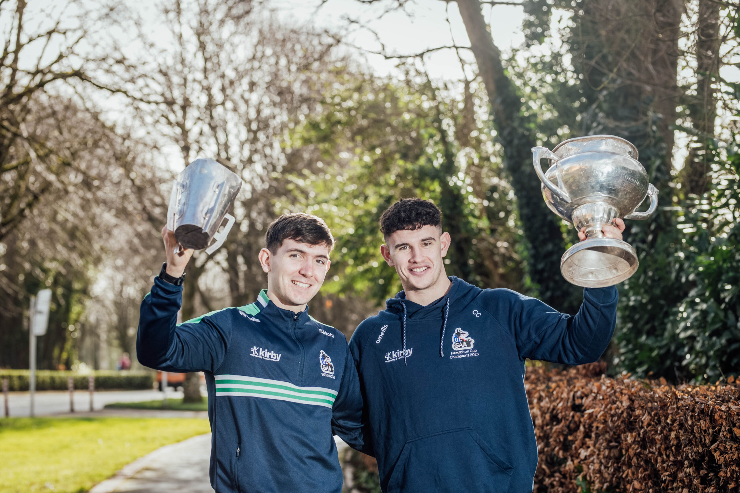 A Golden Era - UL Sigerson captain and Clare midfielder Brian McNamara and UL Fitzgibbon captain and Limerick half back Colin Coughlan hailed at UL homecoming after landmark double success. No Repro Fee UL Cups Event Pic. Brian Arthur