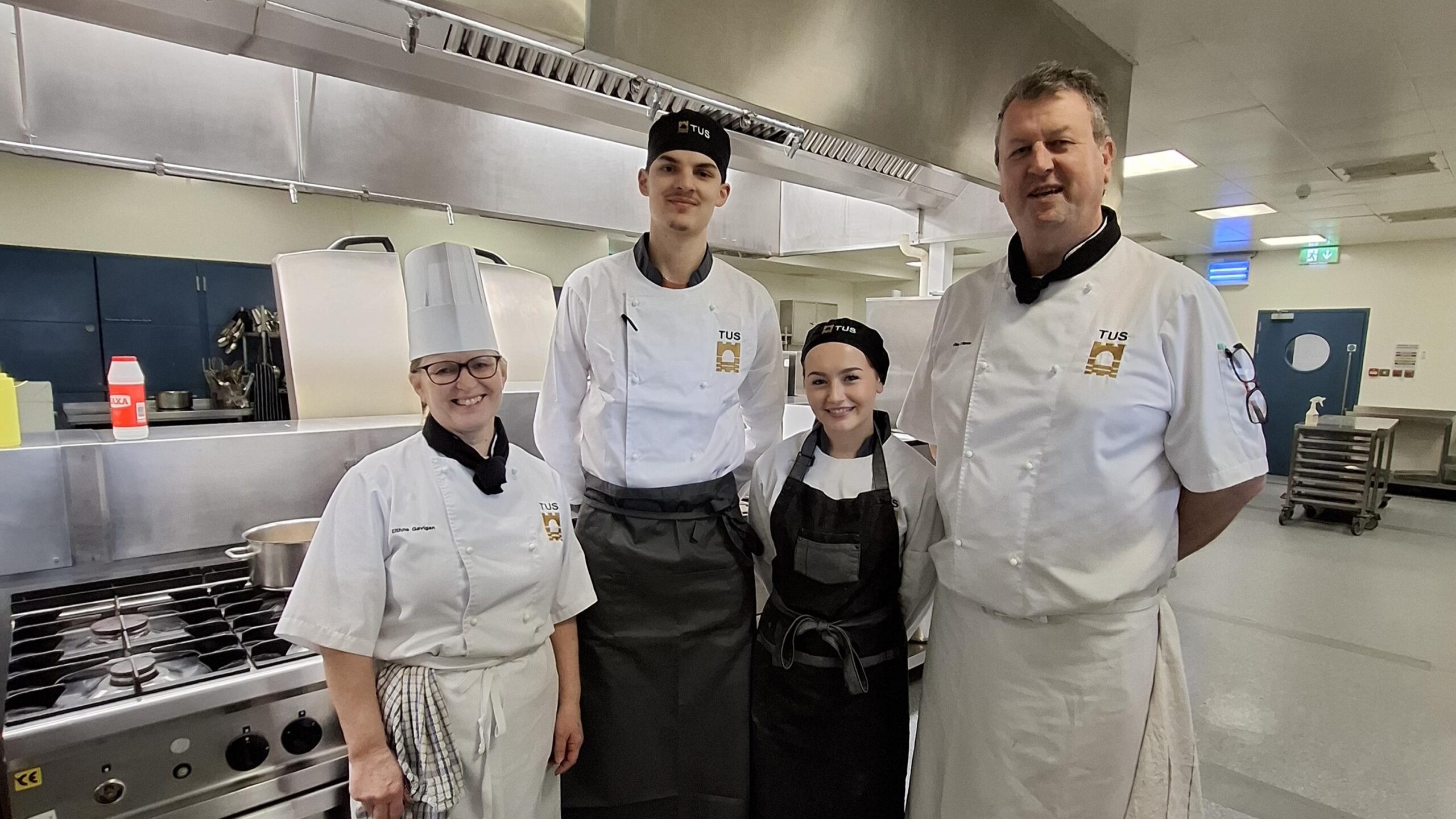 Lecturers Jim O'Meara and Eithne Gavigan with TUS student Lucas Maier, a contestant in the Knorr Professional Student Chef of the Year 2026 Final, and Lucas's assistant in the competition, TUS student Lucia Canalda, at the kitchen on the Moylish campus.
