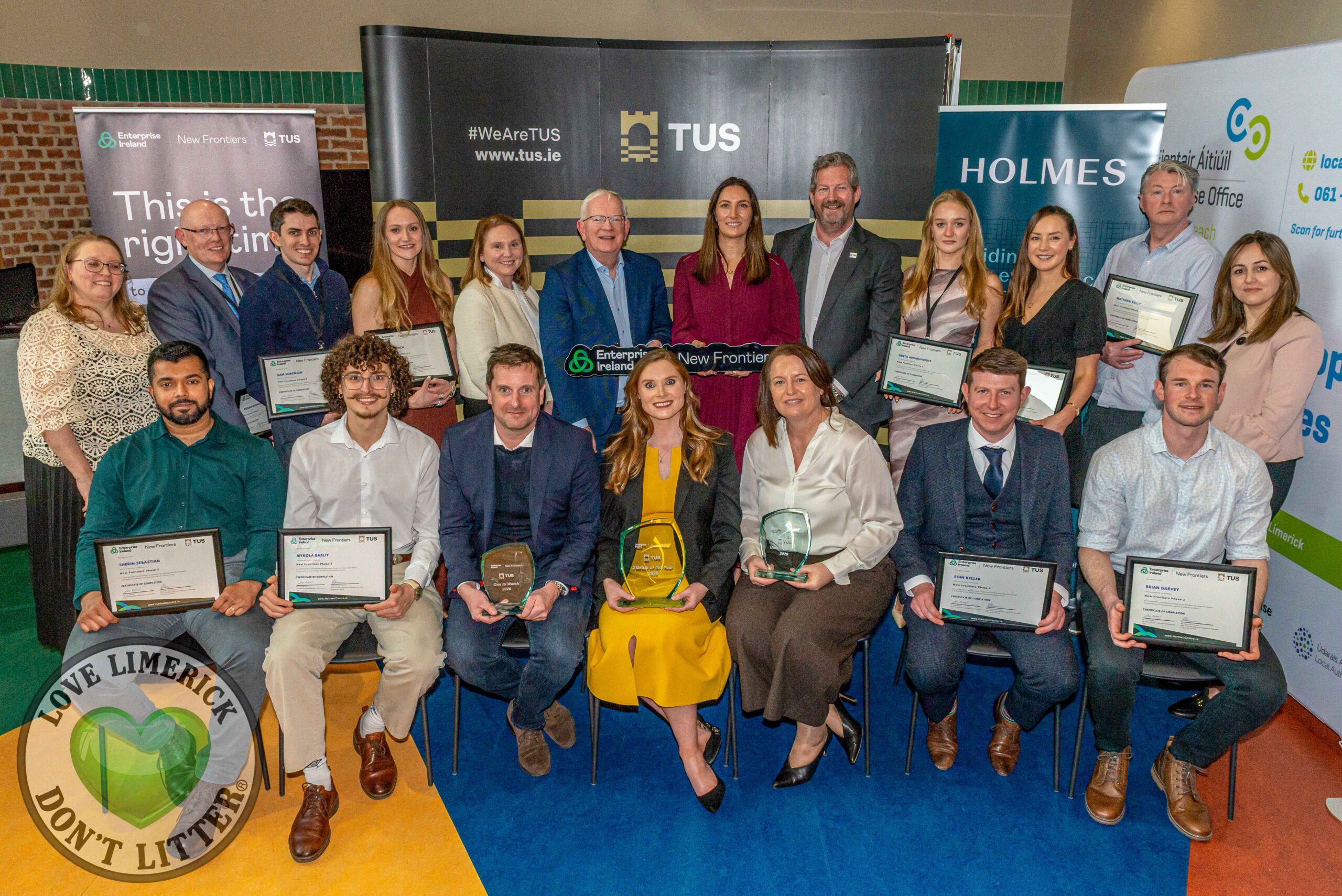 Pictured are Gillian Barry, Head of Innovation & Enterprise TUS (2nd row centre in burgundy), Mary Casey, New Frontiers Programme Manager, Hartnett Enterprise Acceleration Centre, TUS Midwest, Sarah Hayes of Fastwave, winner of TUS Business Innovation Award 2026, Dr Rachel Power of Calm & Free, Startup of the Year 2026 winner, Hugh McNally of Carpal, TUS One to Watch Award 2026 winner and Nadia Hwigi, New Frontiers Programme Officer, Hartnett Enterprise Acceleration Centre, TUS Midwest with other participants from the 2026 TUS New Frontiers Programme. Picture: Olena Oleksienko/ilovelimerick