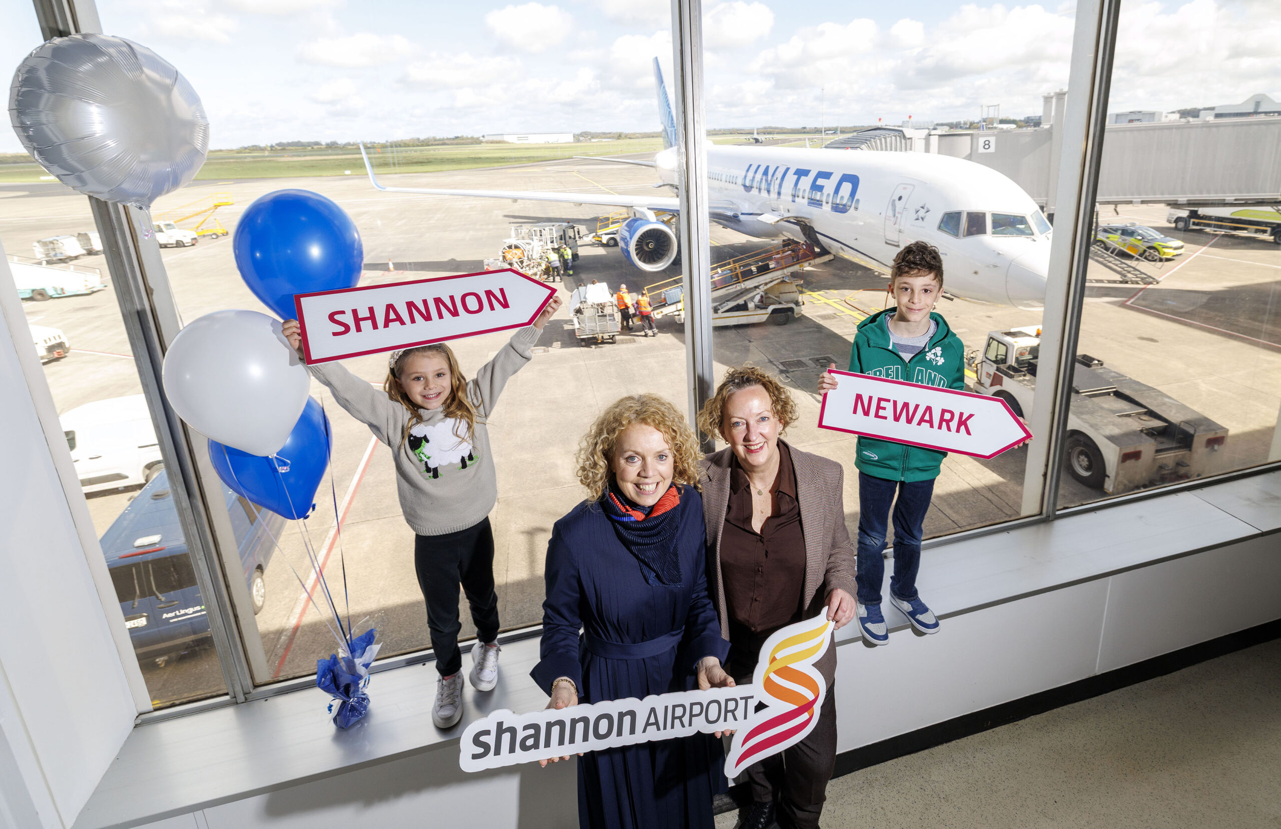 Shannon Airport Celebrates Long Standing Partnership with United Airlines Monday 13th April 2026: Shannon Airport today hosted a special event recognising its long established partnership with United Airlines. This week celebrated its centenary year, having first taken to the skies in 1926. Passengers travelling on the nonstop Shannon–Newark/New York service joined the celebration, enjoying refreshments and music at their departure gate. Pictured are Vanessa McTigue, Commercial Director The Shannon Airport Group and Carmel Hayes, Genereal Manager United Airlines Shannon with Emina (6)and Cristiano Karacica (9)flying United Airlines home to New York today . Pic Arthur Ellis