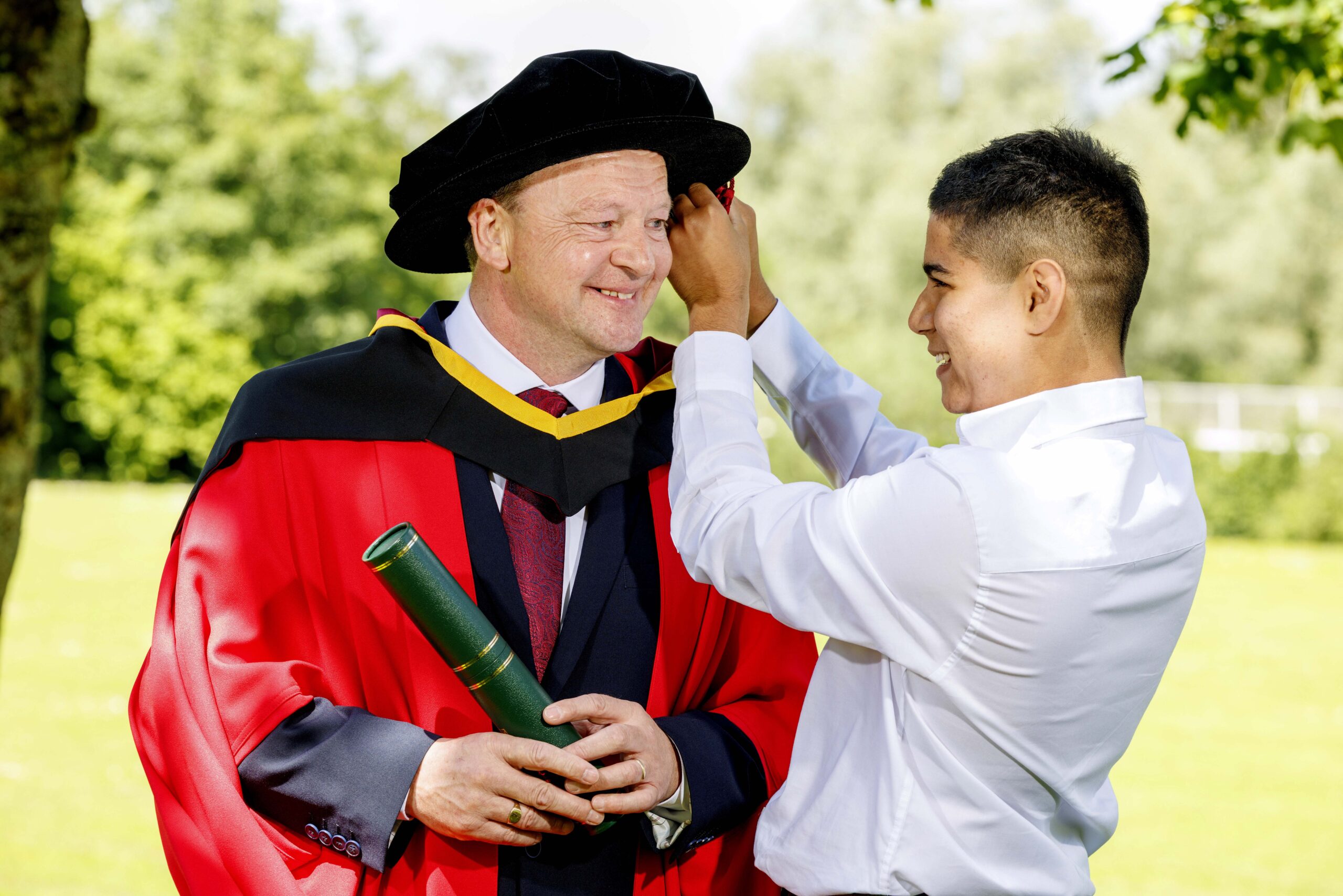 Dr Eddie Keane, lecturer in University of Limerick's School of Law, received his PhD today. Dr Keane was one of more than 1,200 students graduating this week at University of Limerick, pictured with his son Joey (13).Pic Arthur Ellis