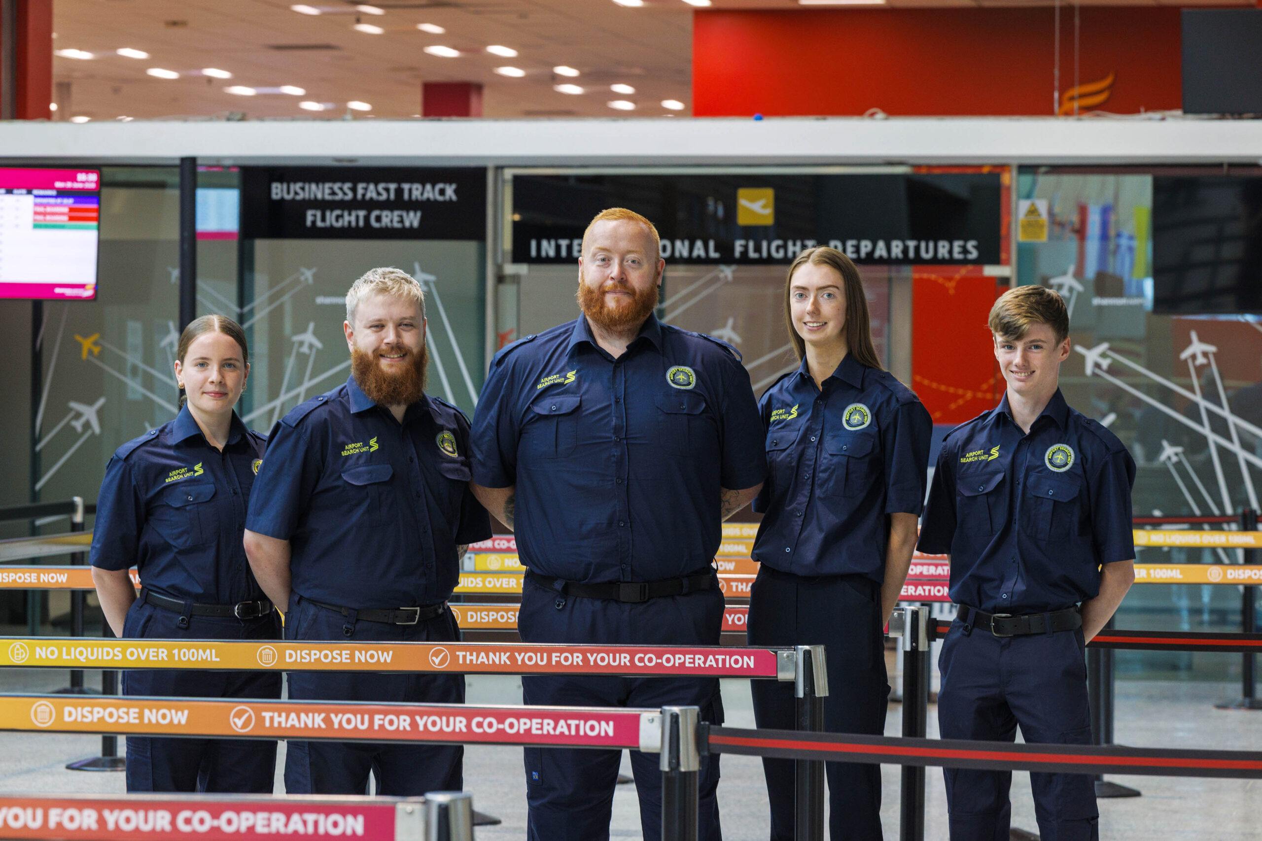 Congratulations to five new Shannon Airport Search Unit (ASU) officers who have completed their training and joined the team during the busy summer season! Hailing from Clare, Limerick and Galway, the new recruits bring a wide range of experience. Following an intensive training programme covering advanced screening systems, cabin baggage search techniques, manual handling and Sunflower Hidden Disability Awareness, they are ready to put their newly acquired skills into practice and help maintain the highest standards of safety, security and customer service at Shannon Airport. L-R Emer Gantly, Beaha Co Galway, Jason Fitzgerald, Limerick City, Gavin O’Kane, Askeaton Co Limerick, Jenny O’Connor, Clooney Quin Co Clare and Gavin Carey, Newmarket on Fergus Co Clare. Pic Arthur Ellis