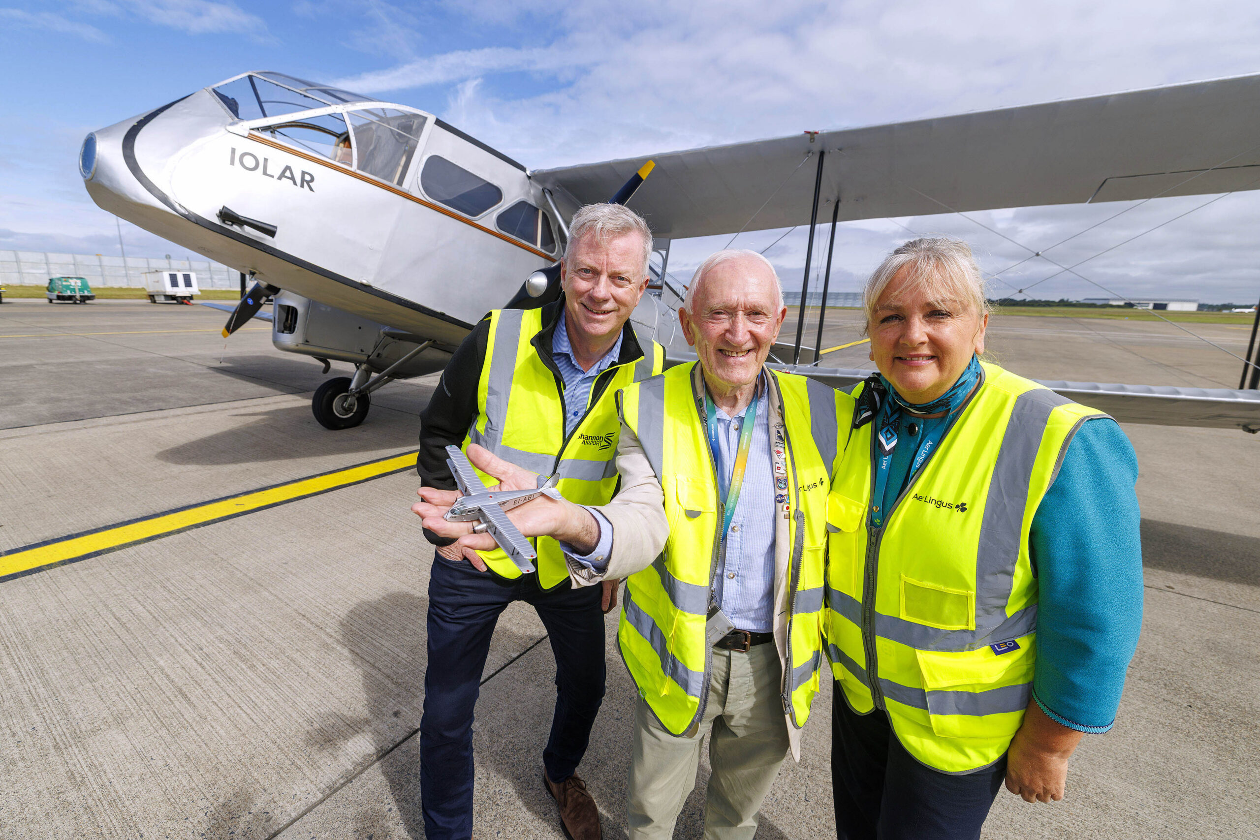 Historic Aer Lingus Iolar aircraft makes unique visit to Shannon Airport Friday 3rd July 2026: Shannon Airport today welcomed one of Ireland’s most iconic, historic aircraft as Aer Lingus’ restored EI-ABI Iolar made a unique visit to the airport during the airline’s 90th anniversary year. Aviation enthusiasts, airport staff and visitors gathered to see the 1936 de Havilland DH.84 Dragon at Shannon providing a unique opportunity to experience a living piece of Irish aviation history. The beautifully restored aircraft - a sister ship to Aer Lingus’ original Iolar, which operated the airline’s inaugural service 90 years ago - is one of the last surviving of its type and provides a unique glimpse into the earliest days of commercial aviation in Ireland. Pictured alongside the Aer Lingus Iolar aircraft during its unique visit to Shannon Airport today are L-R Ray O'Driscoll, CEO The Shannon Airport Group ,Mike Kelly, Curator of the Aviation Galleries at Shannon Airport which house the world’s largest private collection of diecast model aircraft and Colette Malone, Ground Staff, Aer Lingus . Pic Arthur Ellis
