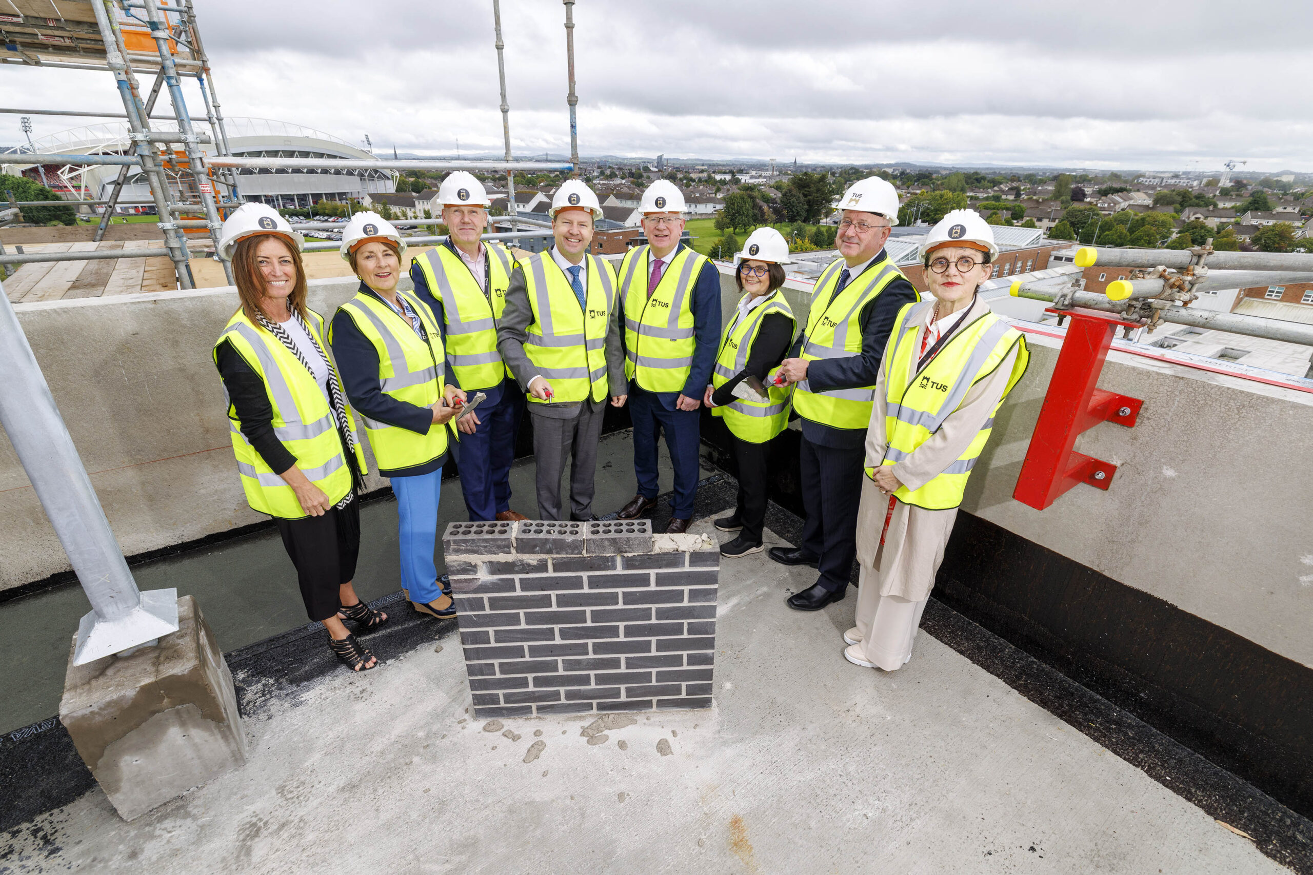 Minister for Further and Higher Education, Research, Innovation and Science James Lawless TD laid a ceremonial brick to mark the topping-out of the new Applied Science and Information Technology building on the Moylish Campus at the Technological University of the Shannon (TUS) , which will provide 5,200 square metres of cutting-edge teaching, research and laboratory space. Pictured with Minister for Further and Higher Education, Research, Innovation and Science James Lawless TD is Professor Vincent Cunnane, President of TUS right) with other members of the TUS team. Pic Arthur Ellis