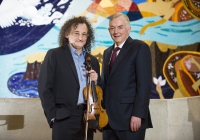 27/01/2016The University of Limerick names Clare fiddler Martin Hayes as its inaugural Irish World Academy Artist.Pictured at the announcement are Professor Don Barry, University of Limerick President, right, and Irish World Academy Artist Martin Hayes.The University of Limerick has announced a new three-year arts patronage award through the Irish World Academy of Music and Dance. The award, entitled Irish World Academy Artist, University of Limerick will facilitate the creative process of selected artists across a three-year period through a budget of €60,000.The first artist to receive the award is Clare fiddler Martin Hayes who commences his three-year association with the Irish World Academy, University of Limerick in January 2016. Martin Hayes has been internationally acclaimed for bringing his local East Clare traditional fiddle style to a global audience through his many performances and recording. More recently he has formed the ensemble The Gloaming which has further pushed the boundaries of Irish traditional music in the field of ensemble playing that started with Sean Ó Riada’s (1930 – 1971) pioneering ensemble Ceóltóirí Chualainn in the 1960s. Hayes also acknowledges the significant influence of Dublin fiddler Tommie Potts (1912 – 1987) on his creative output.The Irish World Academy Artist at the University of Limerick will undertake a series of creative projects across the three-year span. Students of the Academy will have access to open workshops in the state-of-the-art Irish World Academy building on the banks of the river Shannon on the University Campus.(Speaking at the launch of the award) Professor Don Barry, President of the University said: “It is fitting that an artist of the stature of Martin Hayes should be the inaugural Irish World Academy Artist, given Martin’s unique contribution to our cultural life and the Irish World Academy’s vision for Ireland’s past, present and future.”On his appointment, Martin Hayes said: "I'm deeply honoured to be named the first Irish World Academy Artist at the University of Limerick and grateful for the opportunity this three year initiative affords me to explore the possibility of further musical collaboration in such a creative environment.” Professor Mícheál Ó Súílleabháin, Chair of Music and Founder Director of the Irish World Academy said: "The Irish World Academy Artist initiative is further evidence of the commitment of the University of Limerick to the Performing Arts at the highest level. That the first award goes to a local artist with a global reputation builds on the Irish World Academy record of linking the local with the global towards the mutual benefit of both.”Picture credit: Diarmuid Greene/Fusionshooters