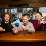 22.11.2016 REPRO FREE Christmas has come early for two Limerick students after they were named overall winners of the 2016 Limerick City Fairtrade Christmas Card Competition at a ceremony in The Savoy Hotel. Pictured at the ceremony were, Jessica Griffin, John the Baptist Community School, Hospital, Paul Reddan from Corpus Christi Primary School in Moyross and Molly O'Brien, Scoil Mhuire in Broadford. Picture: Alan Place