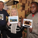 Ian Mills, shop manager, Suzanne Roche, CEO and founder, and Patrick Lananga, volunteer, at the Gateway to Education's delivery of second-hand books to Malawi Event. Picture: Conor Owens/ilovelimerick.