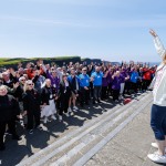 REPRO FREE
080624
Choirs led by acclaimed conductor Bernie Sherlock and members of New Dublin Voices perform against the iconic backdrop of the Cliffs of Moher as part of the annual Limerick Sings International Choral Festival running 7th - 9th June. PIctured is Bernie Sherlock conducting during their performance at the Cliffs of Moher in Clare. Pic Arthur Ellis.